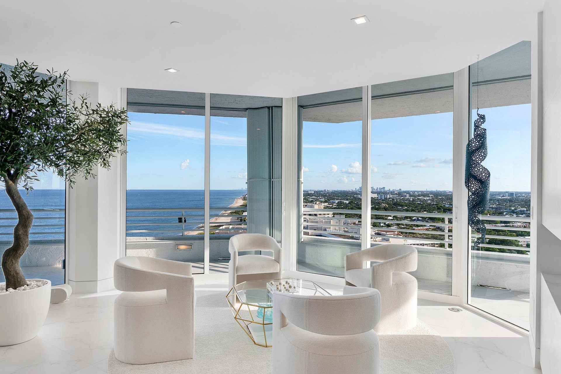 1700 S OCEAN Boulevard, #PH B-D, Lauderdale By The Sea, FL 33062 The sitting room has timeless views with elegant moments of silence and serenity, Book reading inside or outside with the sound of the waves.