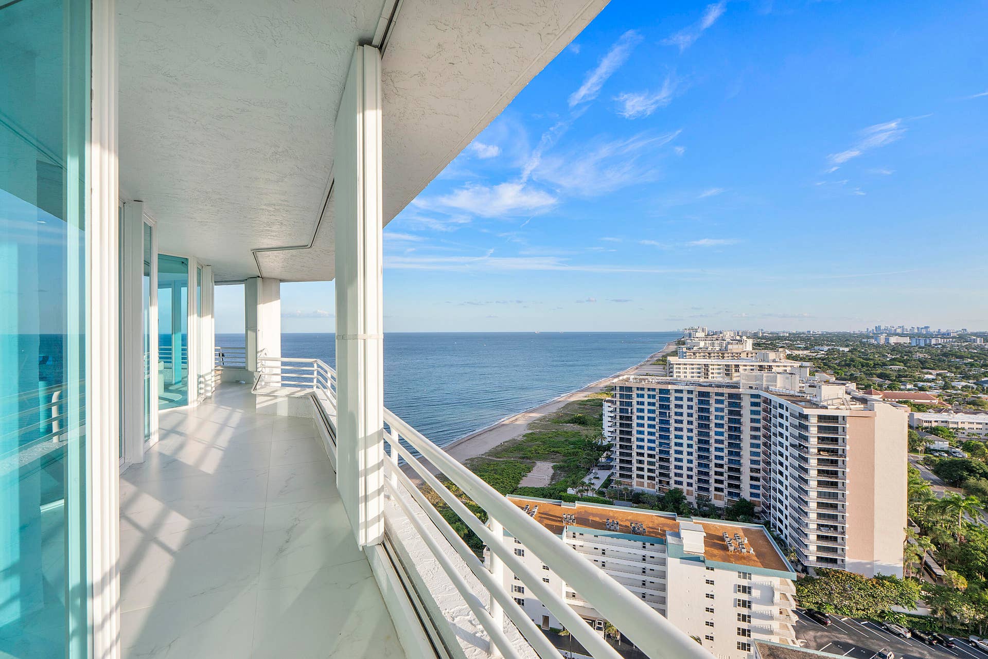 1700 S OCEAN Boulevard, #PH B-D, Lauderdale By The Sea, FL 33062 Expansive covered balconies, finished in elegant European porcelain, wrap the residence in spectacular southeast-facing views where the turquoise Atlantic meets the sweeping Fort Lauderdale coastline. From this elevated vantage point, the shoreline stretches seemingly forever, creating a breathtaking panorama of ocean, beach and city beneath an endless South Florida sky. Generously proportioned and beautifully sheltered, these outdoor terraces feel like true extensions of the interior living spacesperfect for morning coffee, sunset cocktails, alfresco dining, or simply watching the coastline come alive from above.