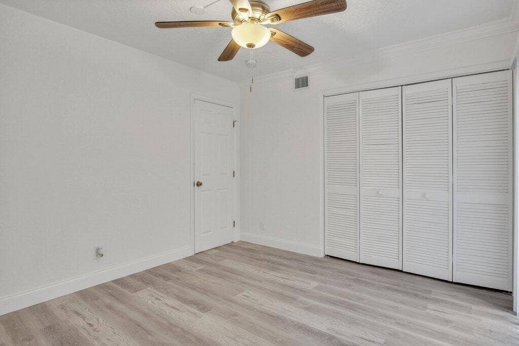Guest Bedroom to Entry.jpg-SMALL