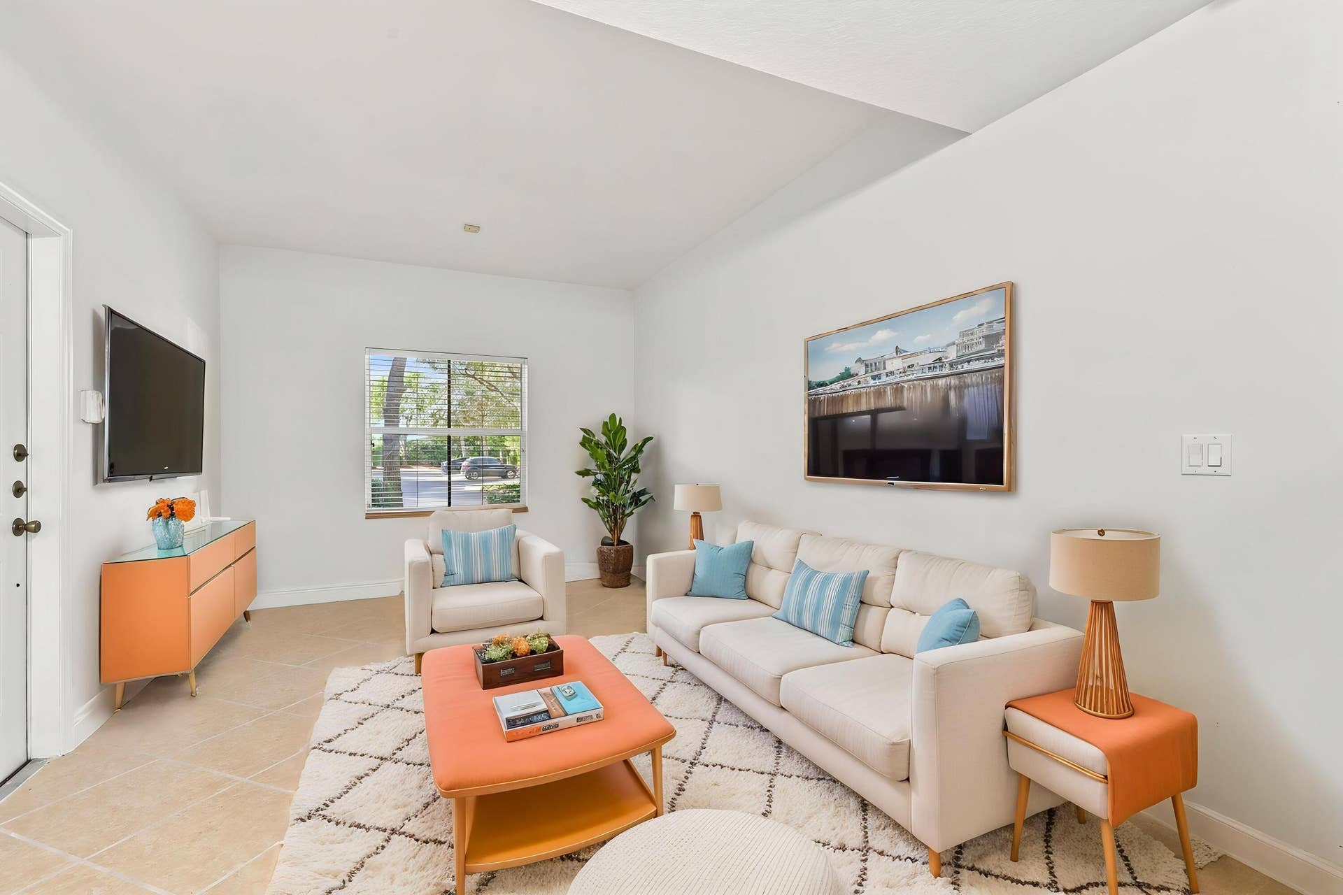 2107 Anchor Court, Fort Lauderdale, FL 33312 Spacious living room with tile flooring, high ceilings, abundant natural light, and an open layout that flows seamlessly into the dining area and kitchen.
