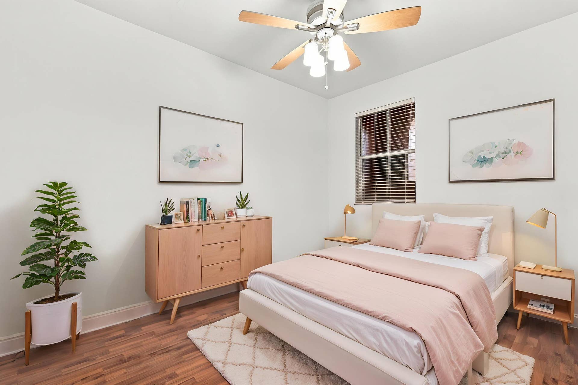 2107 Anchor Court, Fort Lauderdale, FL 33312 Spacious guest bedroom with wood flooring, ceiling fan, generous closet space, natural light, and a private ensuite full bathroom.
