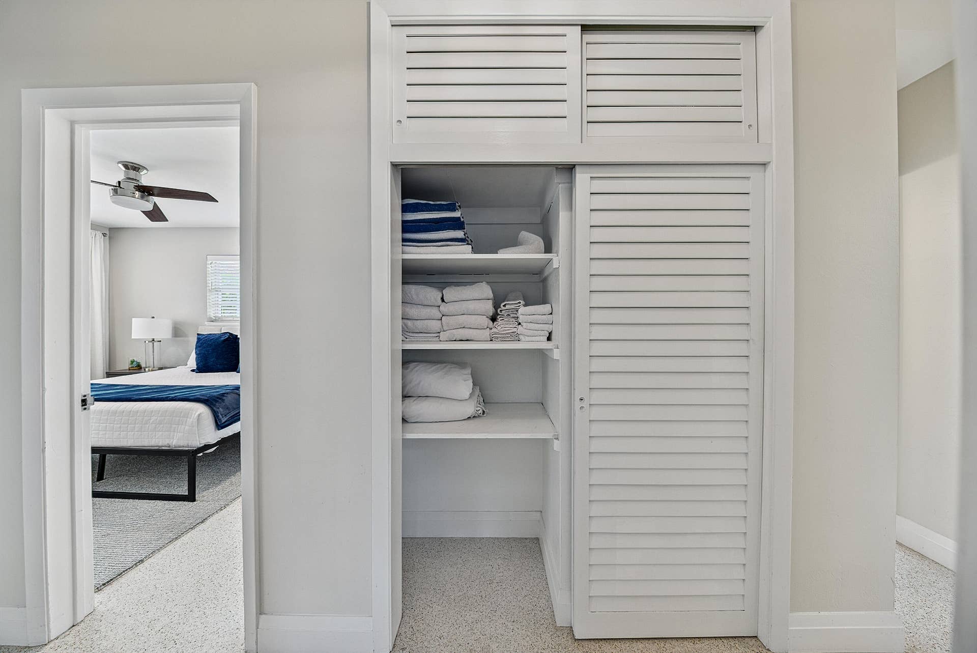 Louvered bifold doors with internal shelving