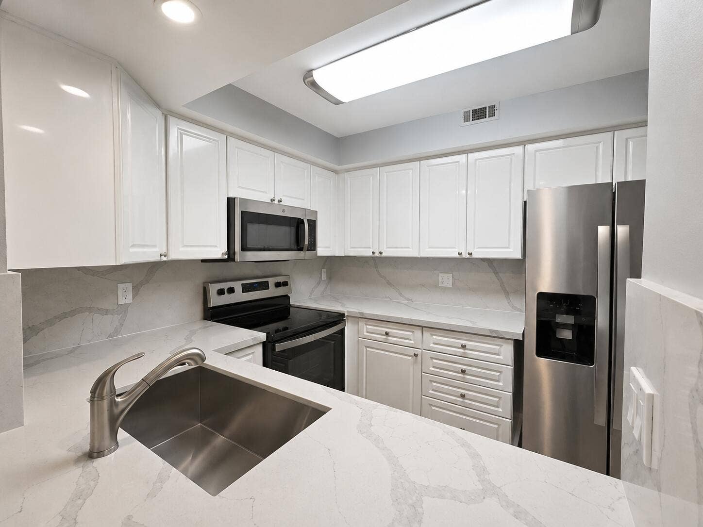 Kitchen with stainless steel appliances