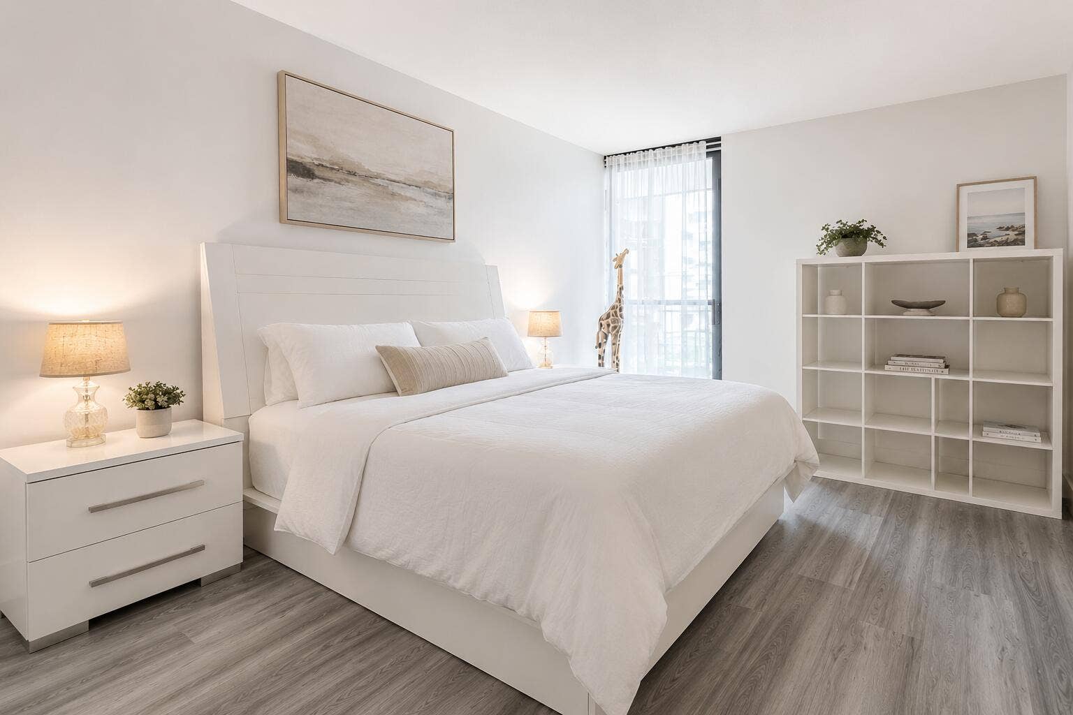 Comfortable guest bedroom with ample closet space and balcony access
