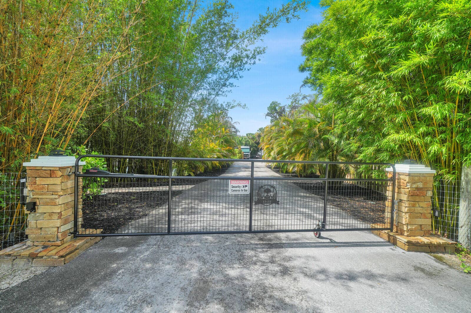 13432 153RD Road N, Jupiter, FL 33478 Front electric gate