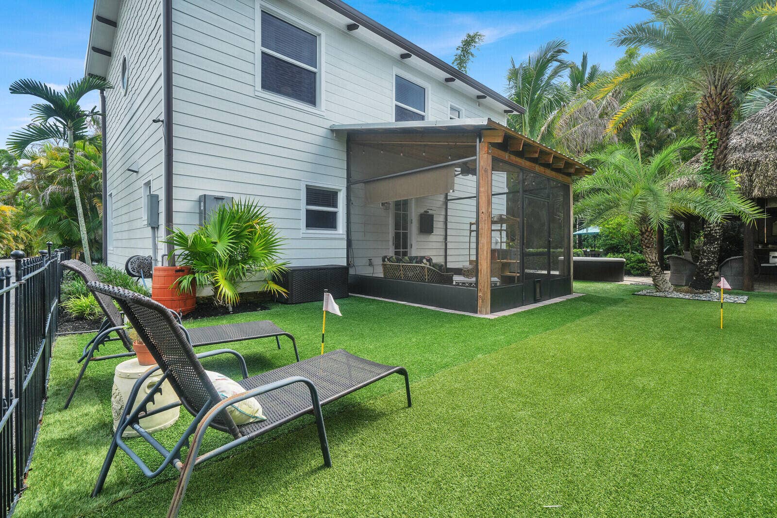 13432 153RD Road N, Jupiter, FL 33478 back screened in porch with turf lawn