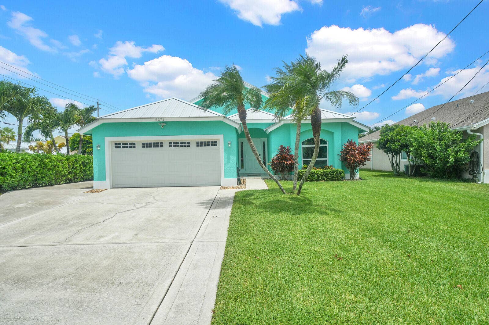 6371 DANIA Street, Jupiter, FL 33458 Front Exterior at Twilight