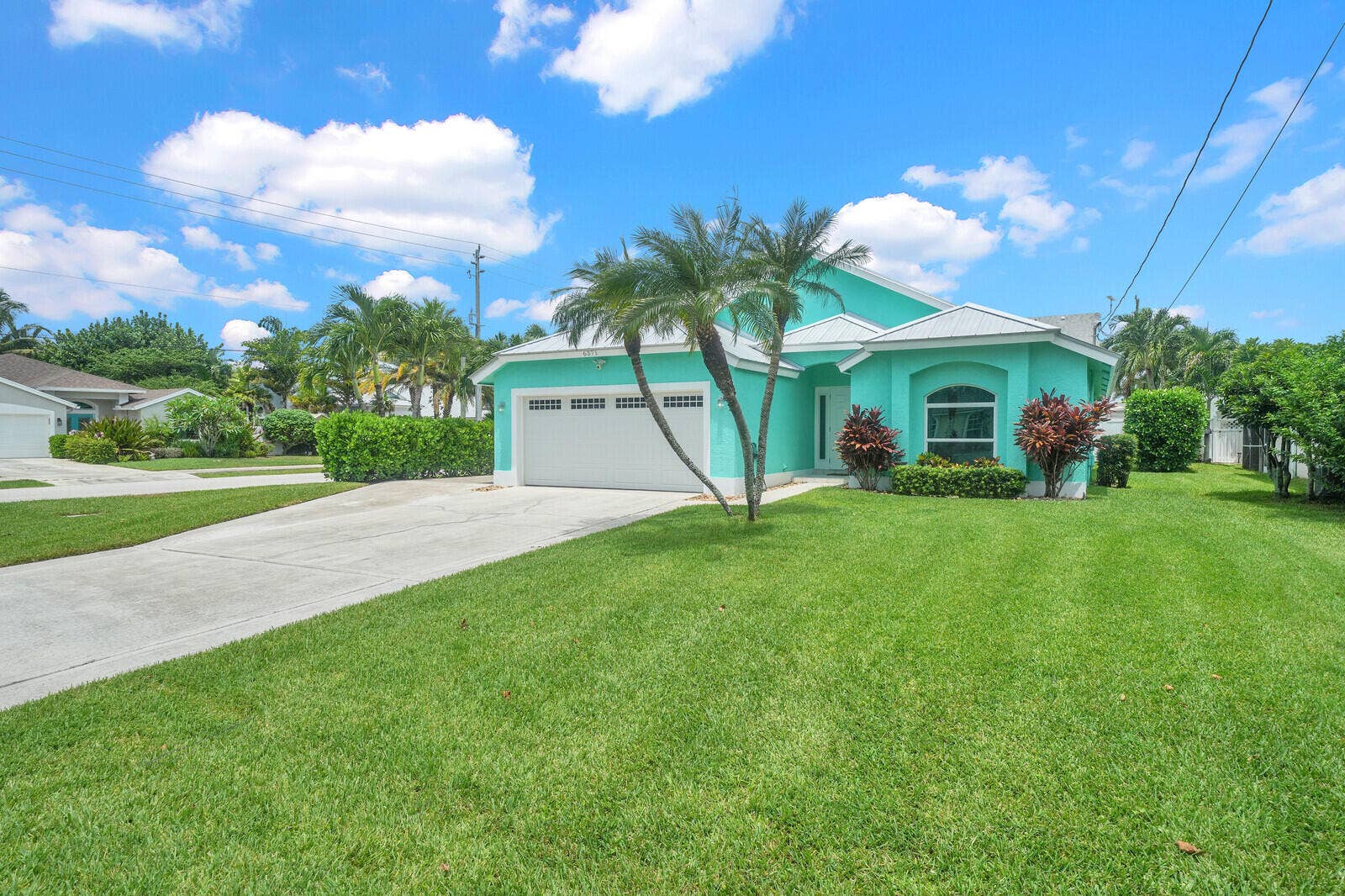 6371 DANIA Street, Jupiter, FL 33458 Front Exterior at Twilight
