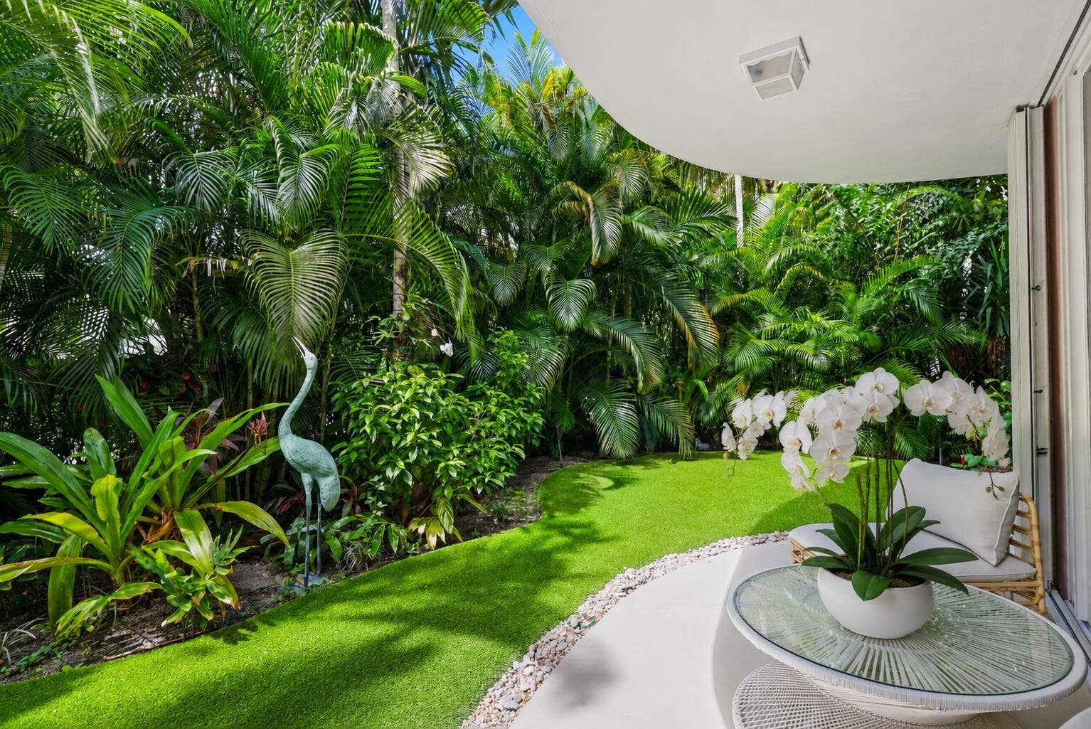 429 Australian Avenue, #3, Palm Beach, FL 33480 Virtually added orchid arrangement.