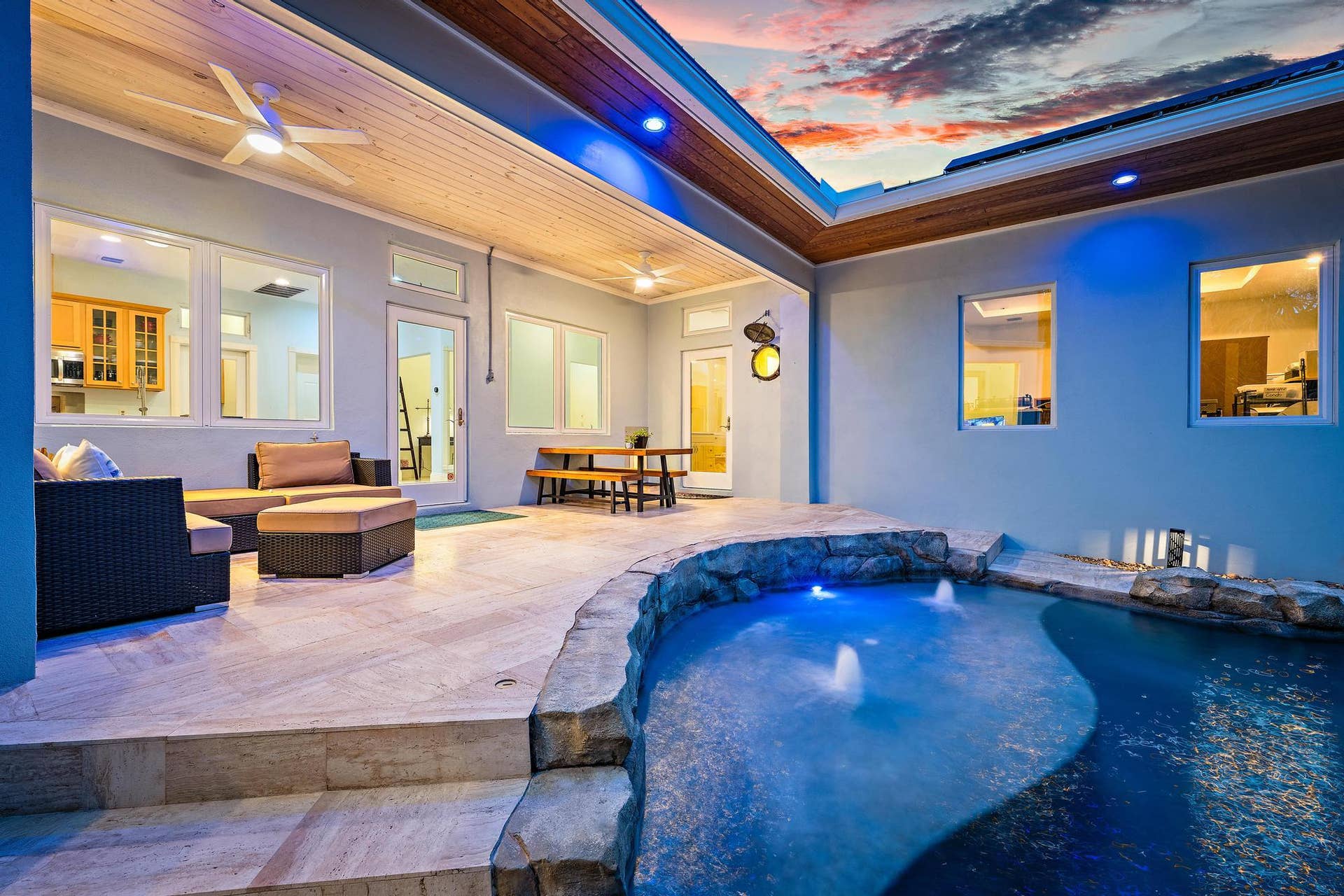Covered patio featuring a wood-finish ceiling, ceiling fans, and recessed lighting