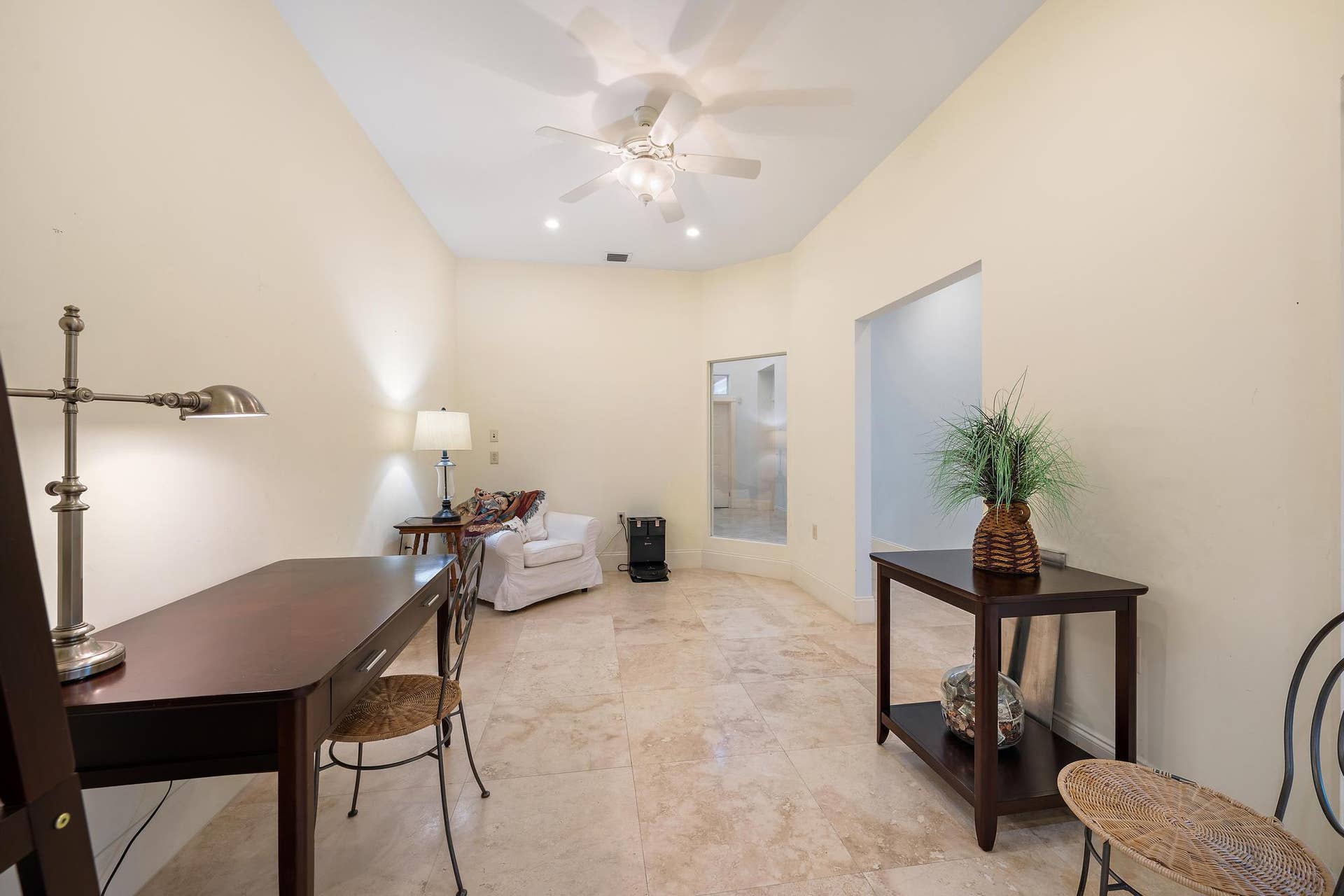 Vaulted ceiling with a ceiling fan, recessed lighting, and tile flooring