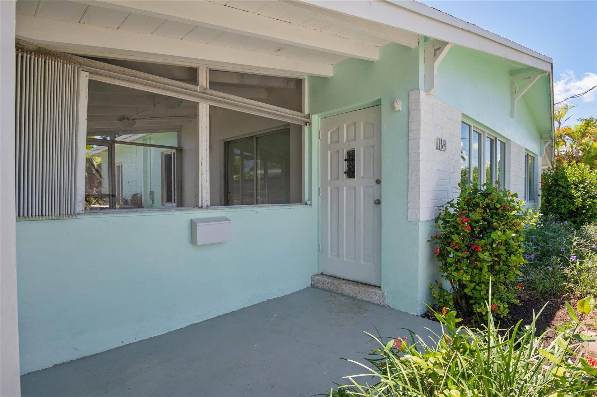 1158 Grant Street, Hollywood, FL 33019 Front door entryway and screened patio o