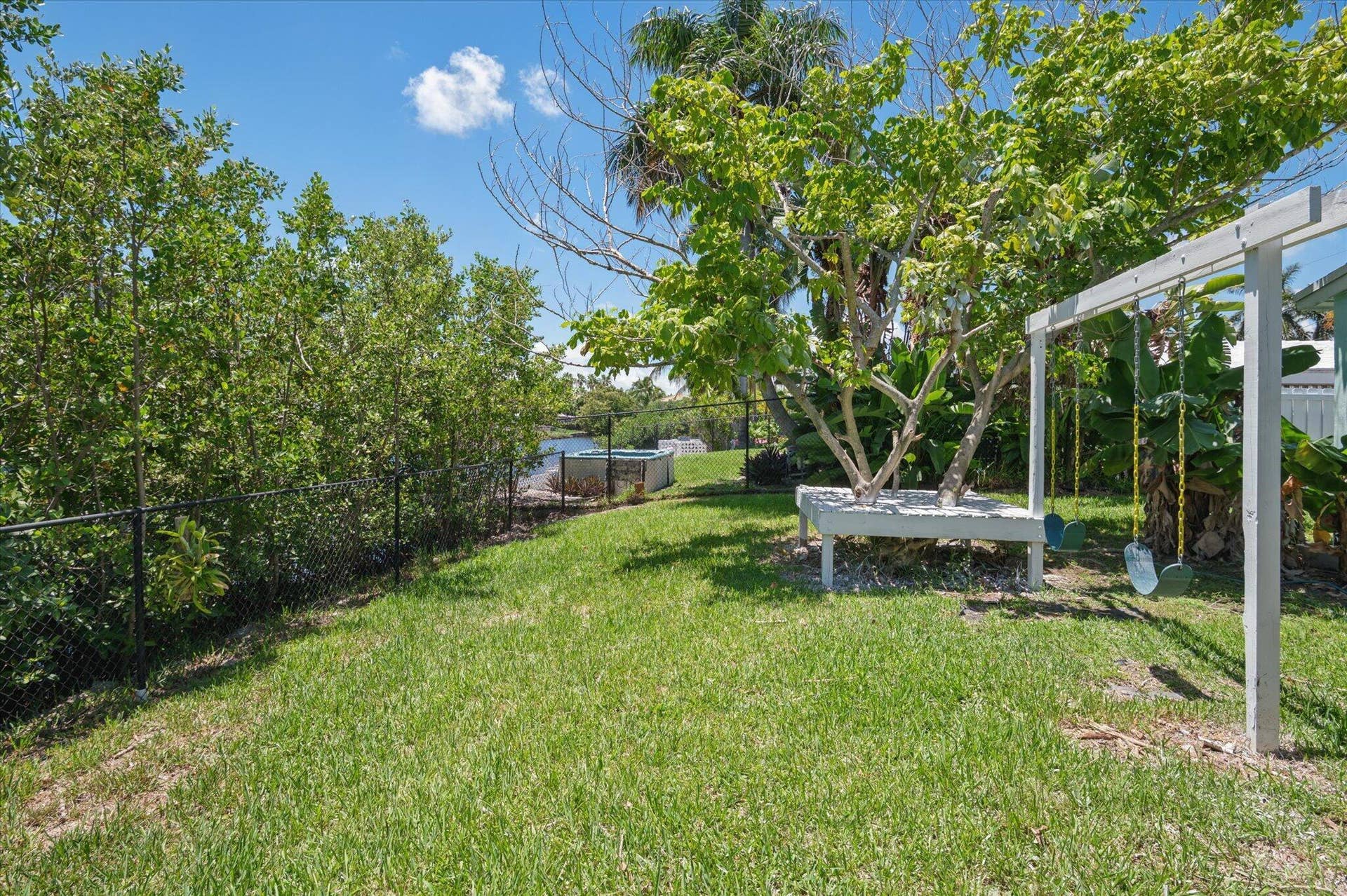 1158 Grant Street, Hollywood, FL 33019 Back yard with swingset