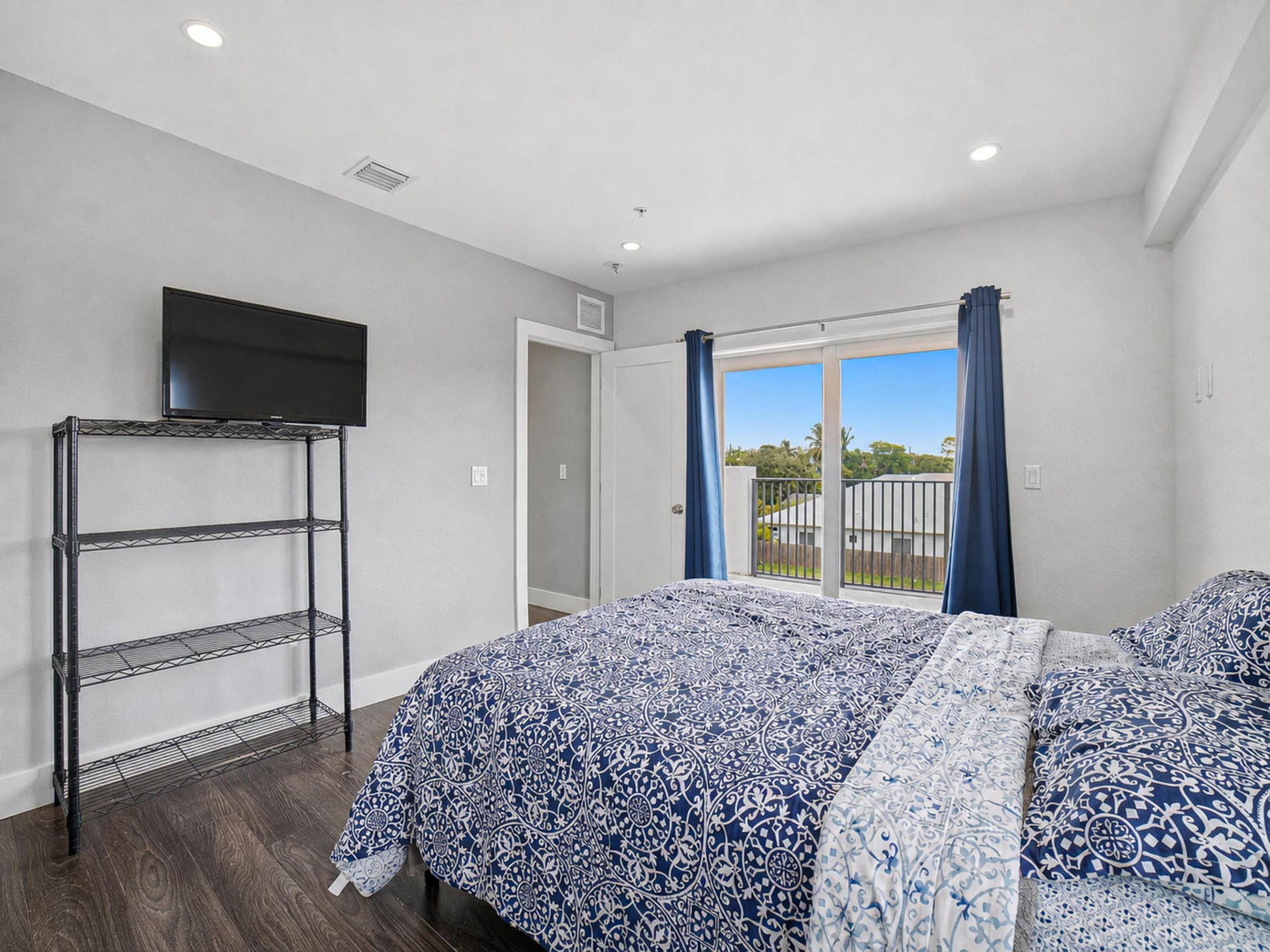 This Bedroom has access to the large balcony on the side of the home.