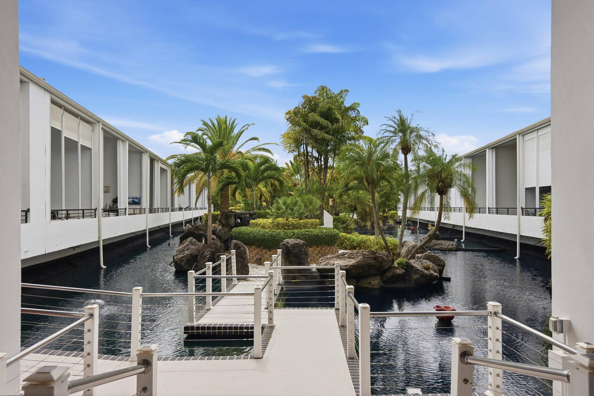 3589 S Ocean Boulevard, #808, South Palm Beach, FL 33480 Expansive water feature with a central landscaped island
