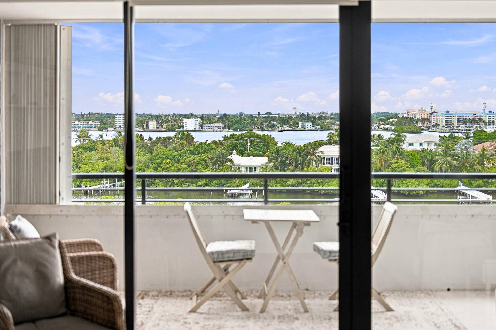 3589 S Ocean Boulevard, #808, South Palm Beach, FL 33480 Private balcony featuring a water-facing orientation and glass sliding doors