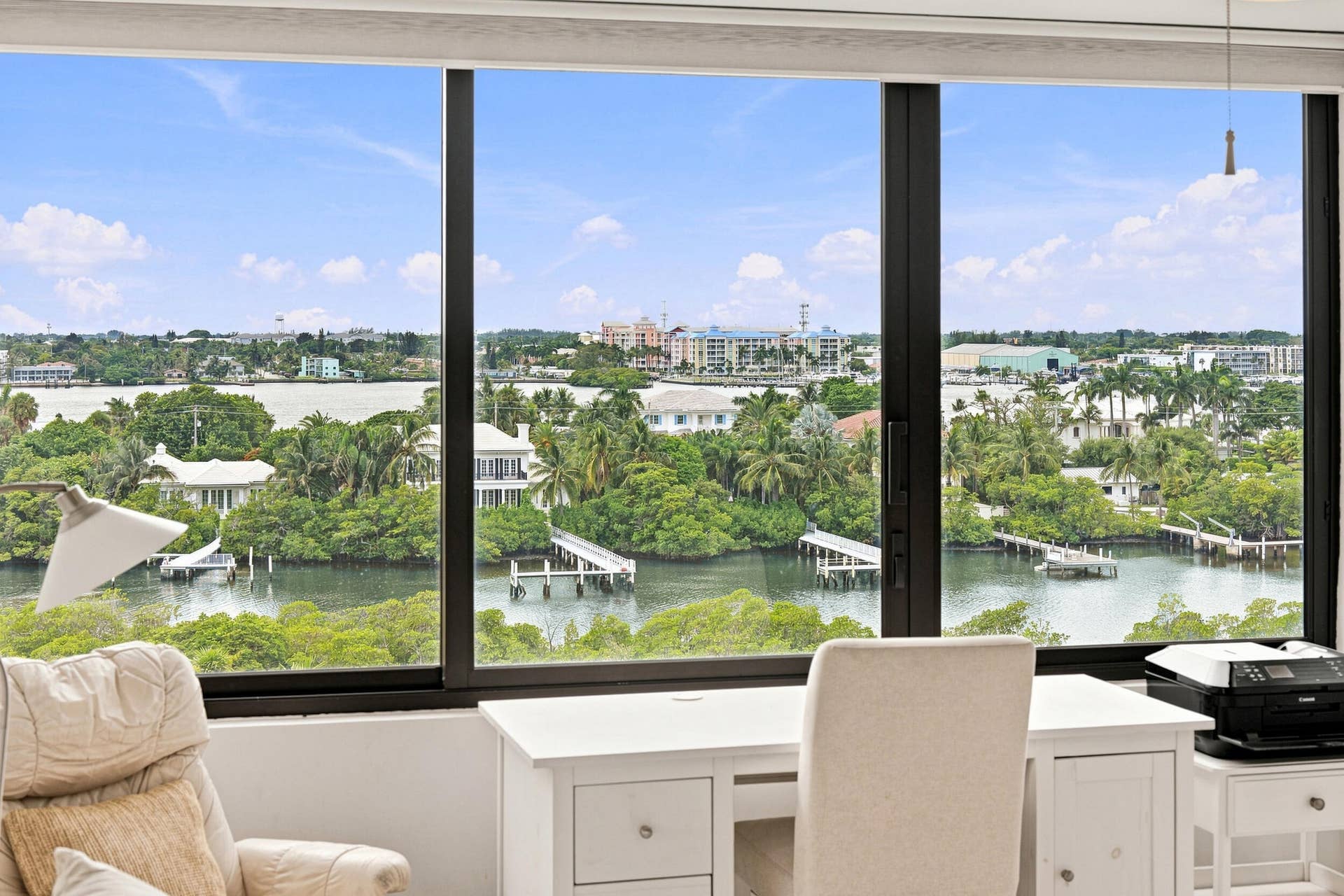 3589 S Ocean Boulevard, #808, South Palm Beach, FL 33480 Floor-to-ceiling windows framing expansive water and city views