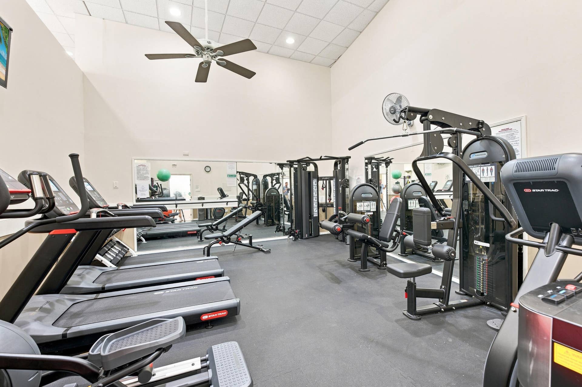 3589 S Ocean Boulevard, #808, South Palm Beach, FL 33480 Dedicated fitness center featuring multiple treadmills, ellipticals, and strength training equipment