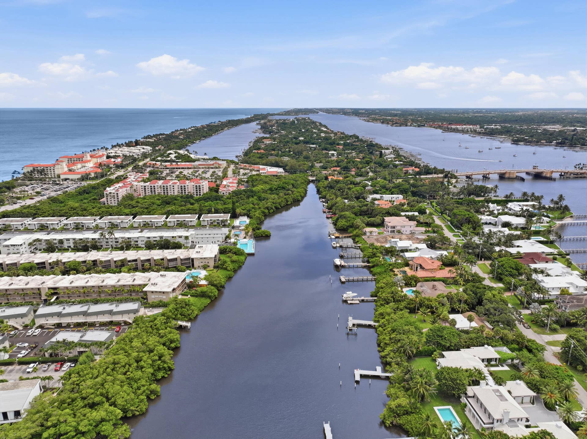 3589 S Ocean Boulevard, #808, South Palm Beach, FL 33480 Aerial perspective showcasing waterfront properties along a canal and oceanfront