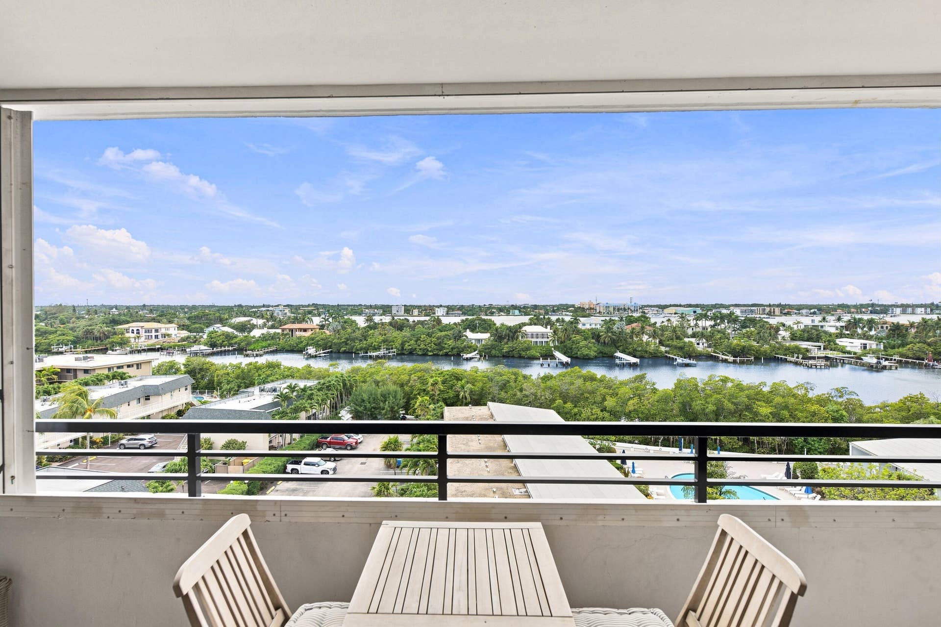 3589 S Ocean Boulevard, #808, South Palm Beach, FL 33480 Private balcony featuring a black metal railing and expansive water views