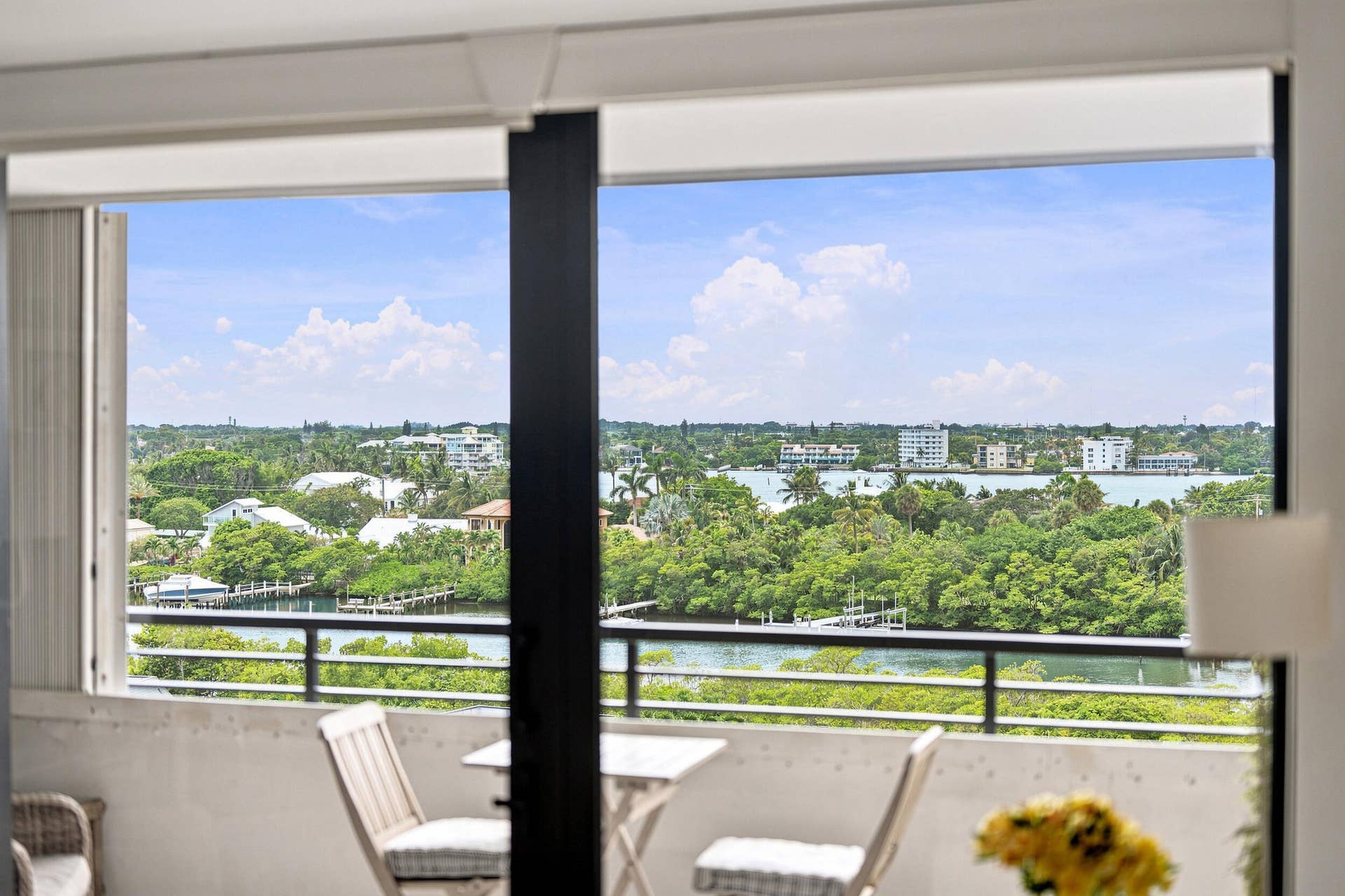 3589 S Ocean Boulevard, #808, South Palm Beach, FL 33480 Balcony featuring a black metal railing and expansive water views