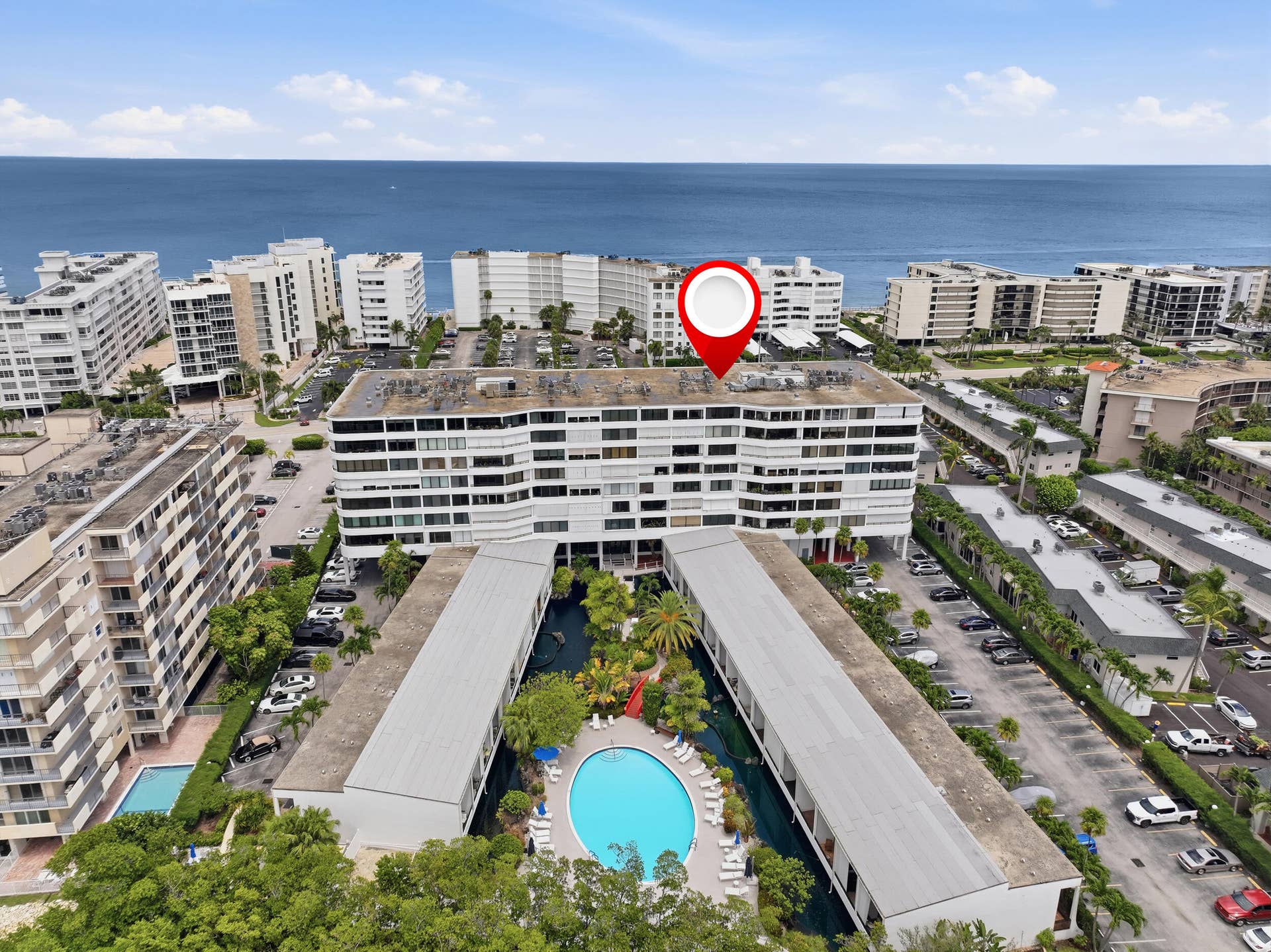 3589 S Ocean Boulevard, #808, South Palm Beach, FL 33480 Coastal high-rise property featuring multiple balconies and a clear ocean backdrop