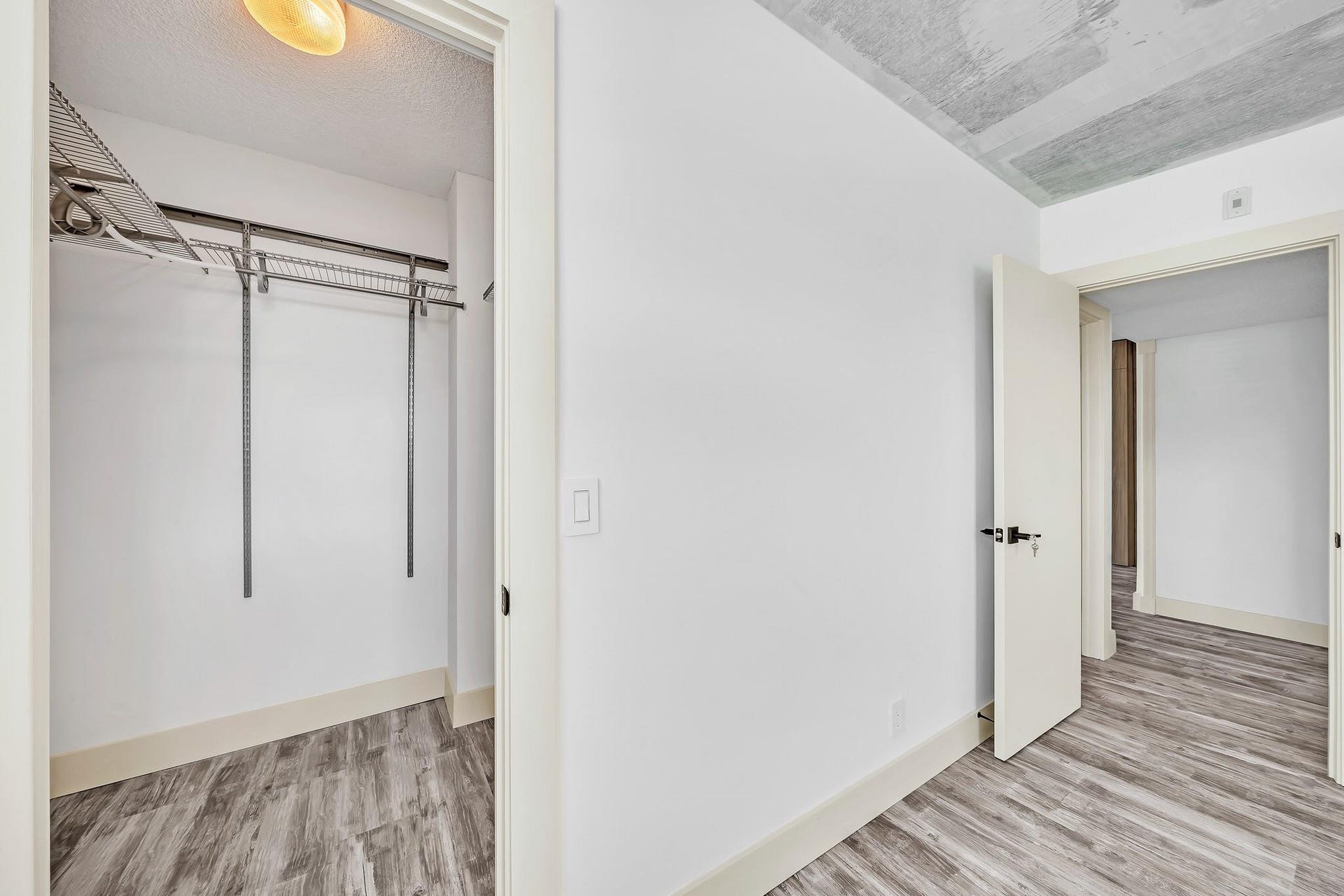 3051 NE 48TH Street, #301, Fort Lauderdale, Fort Lauderdale, FL 33308 Walk-in closet with wire shelving and hanging rods
