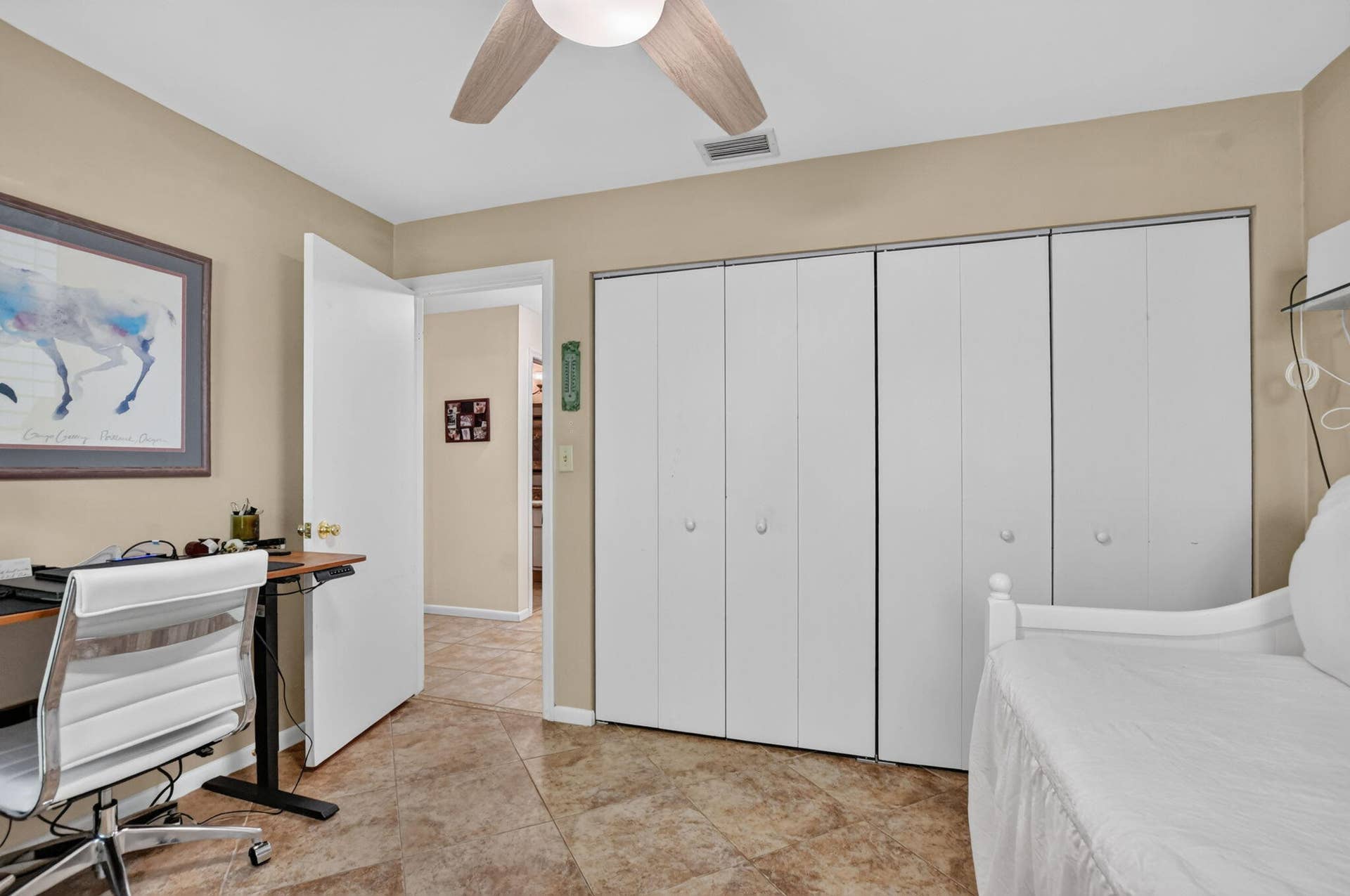 Recessed lighting, ceiling fan with light fixture, bi-fold closet doors, and tile flooring