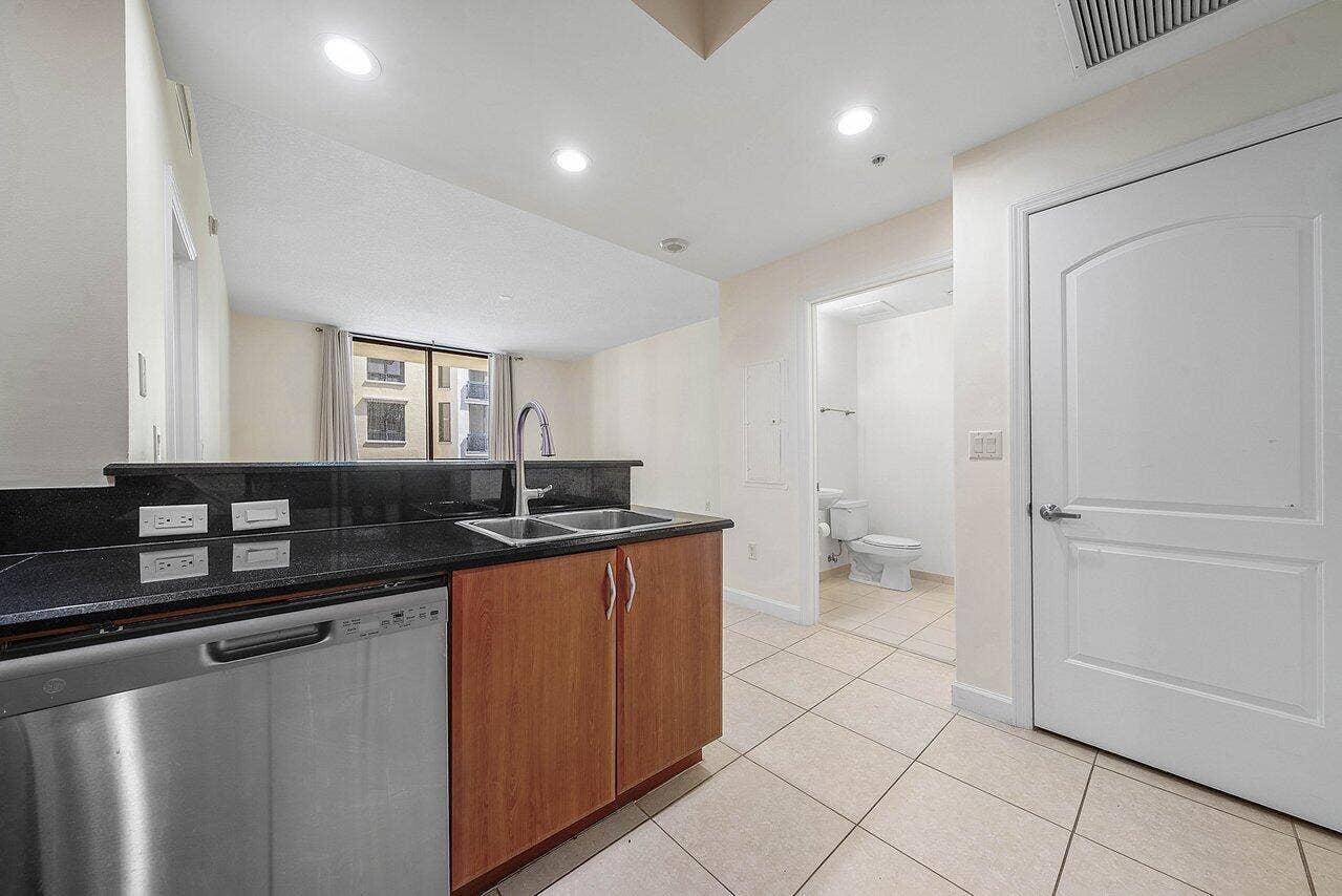 801 S Olive Avenue, #715, West Palm Beach, FL 33401 Kitchen with Laundry closet