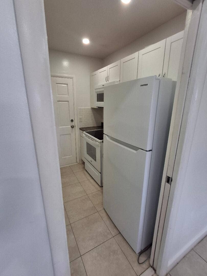 1250 E SAMPLE Road, #303, Pompano Beach, FL 33064 HH13