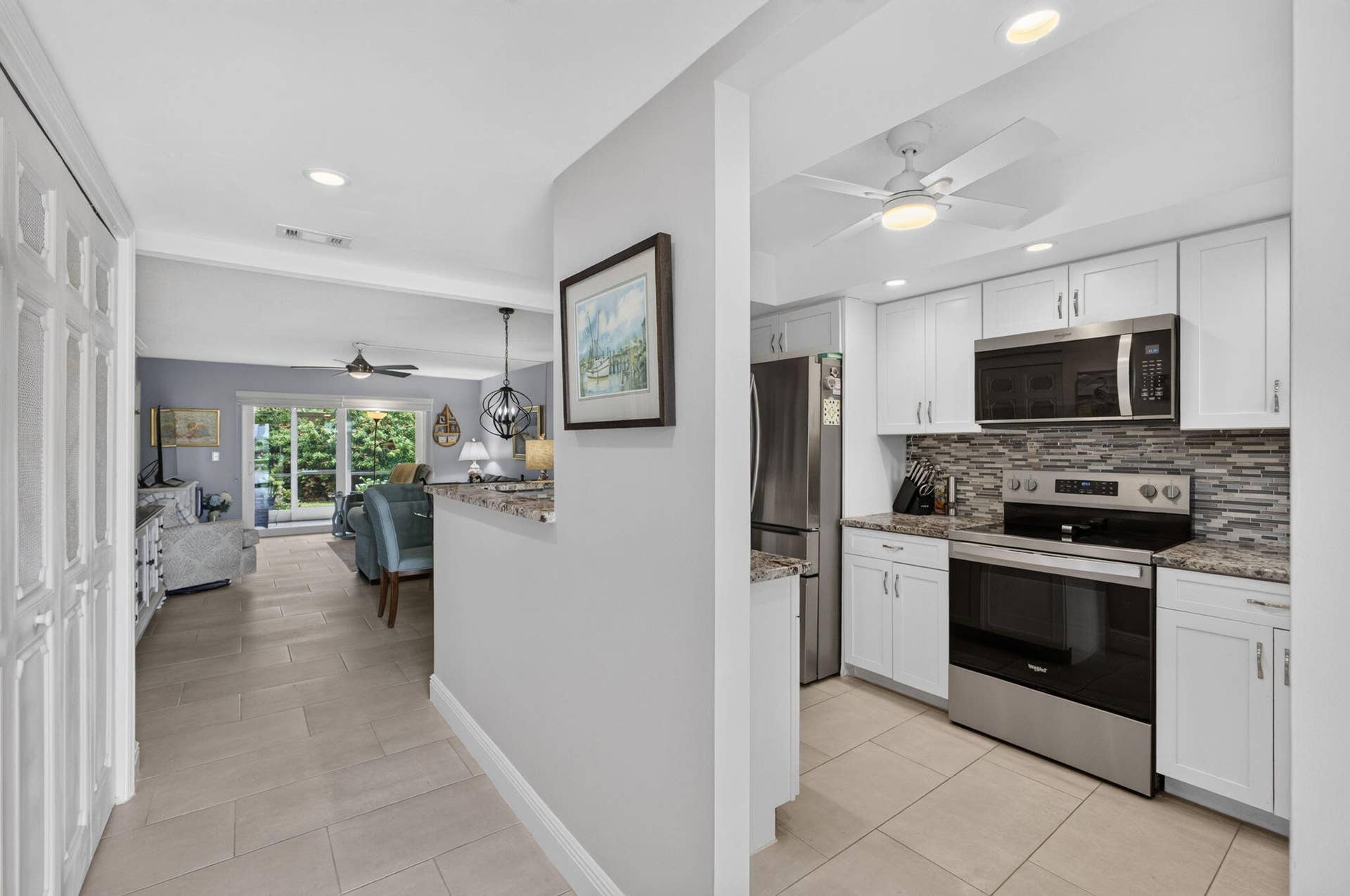 1251 Sugar Sands Boulevard, #124, Singer Island, FL 33404 Entrance with Kitchen LR View