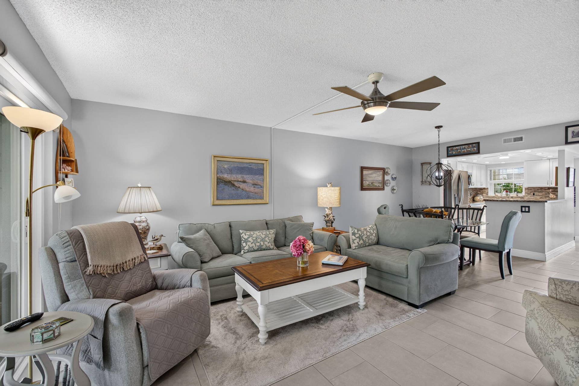 1251 Sugar Sands Boulevard, #124, Singer Island, FL 33404 LR DR View without Grand and Curio