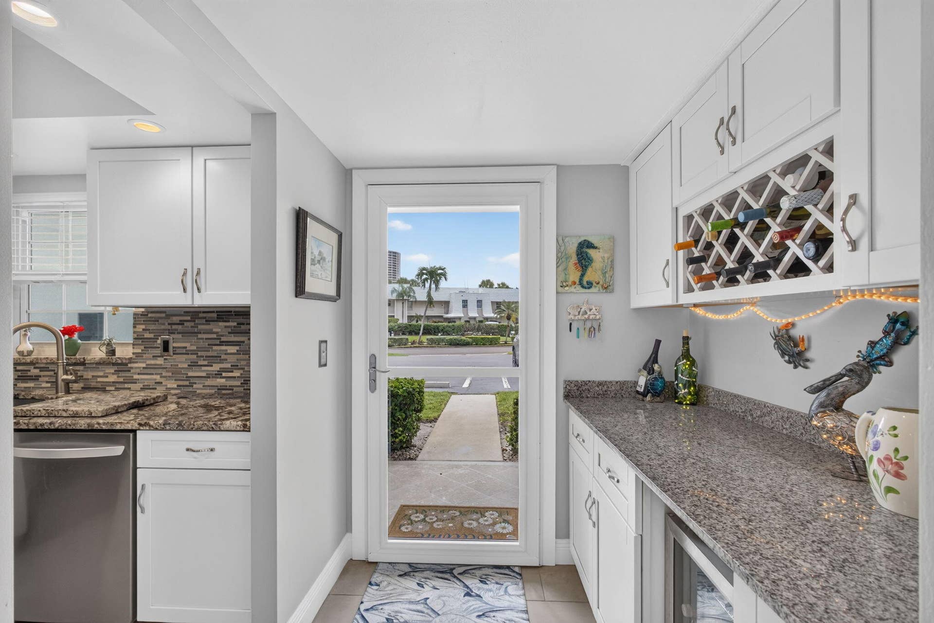 1251 Sugar Sands Boulevard, #124, Singer Island, FL 33404 Front Door Inside View of Outside