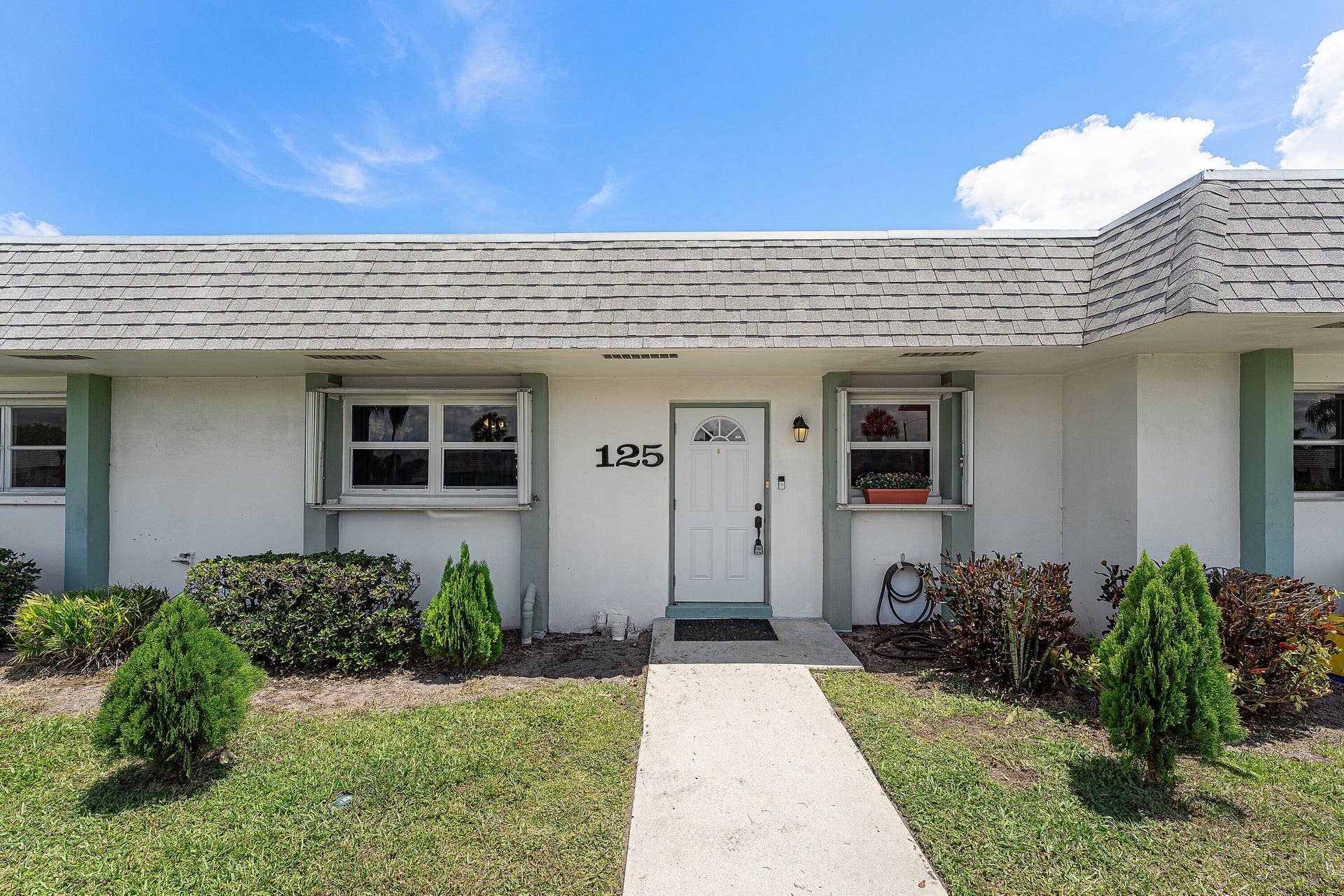 2638 GATELY Drive E, #125, West Palm Beach, FL 33415 2 parking spots directly in front of unit