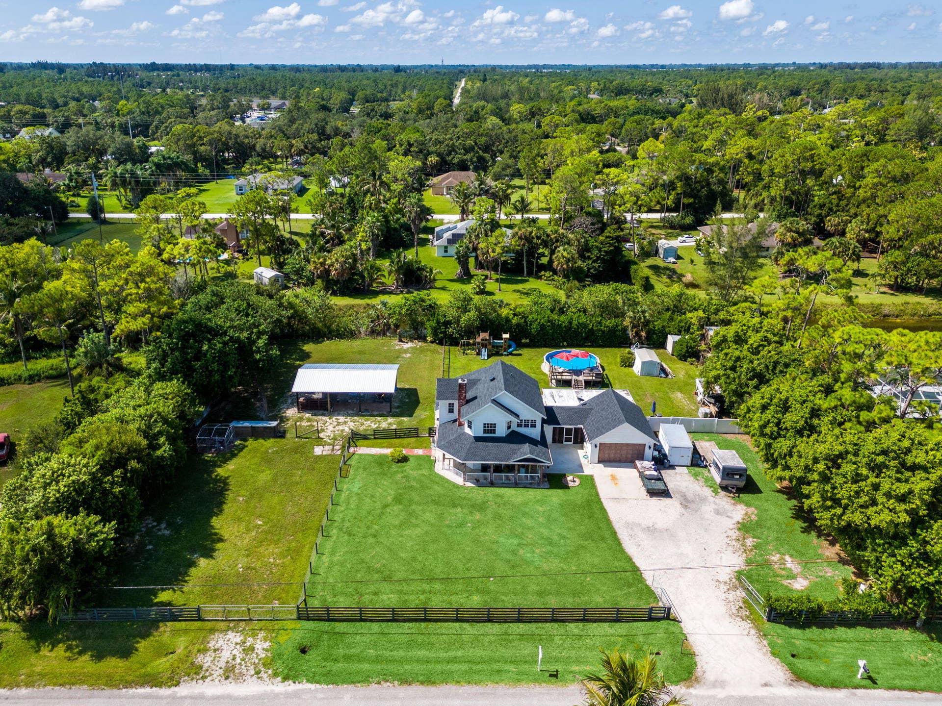14366 73rd Street N, Loxahatchee, FL 33470 57-web-or-mls-DJI_20260812110644_0190_D