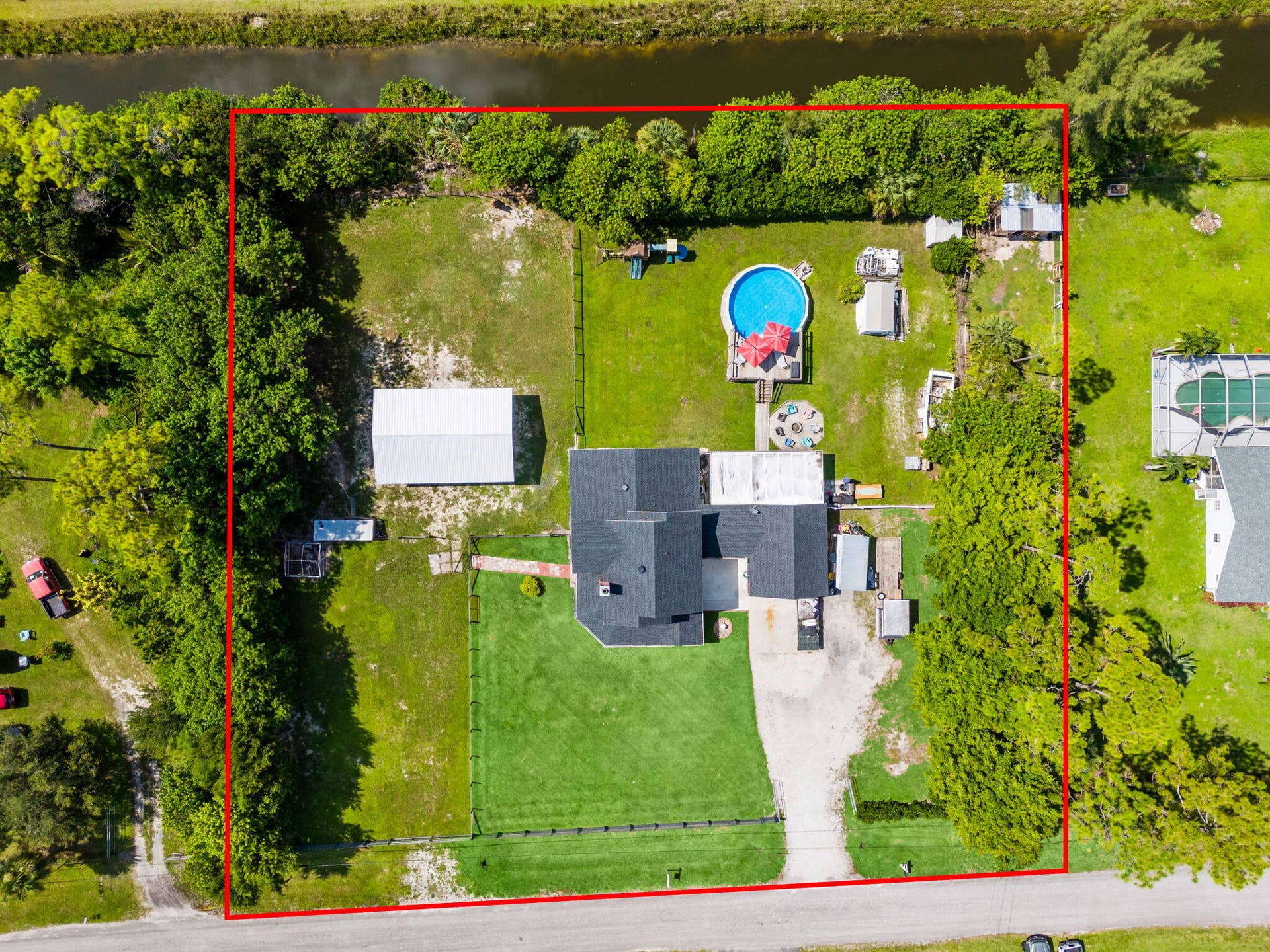 14366 73rd Street N, Loxahatchee, FL 33470 65-web-or-mls-DJI_20260812111010_0202_D-