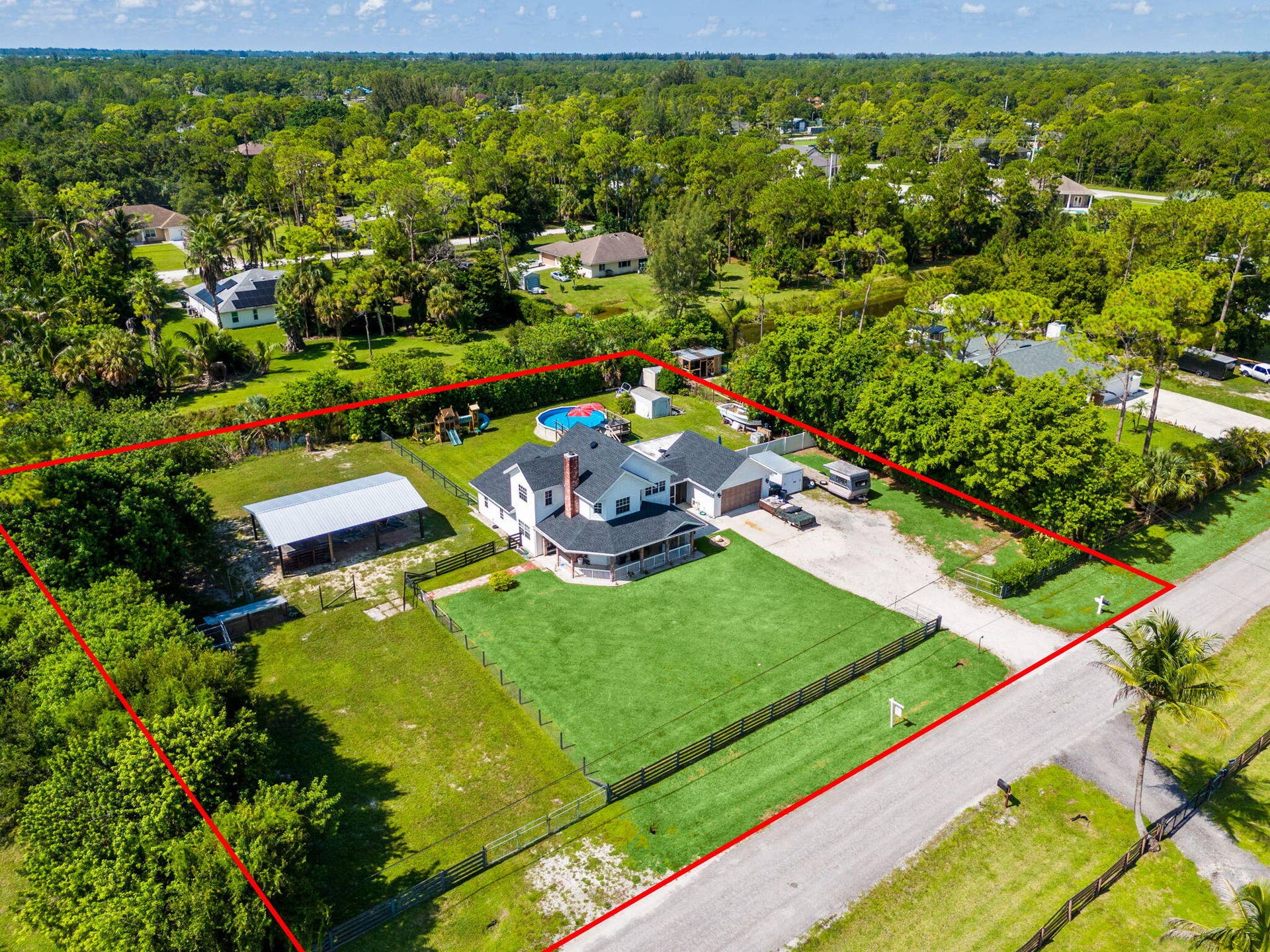 14366 73rd Street N, Loxahatchee, FL 33470 61-web-or-mls-DJI_20260812110657_0191_D-