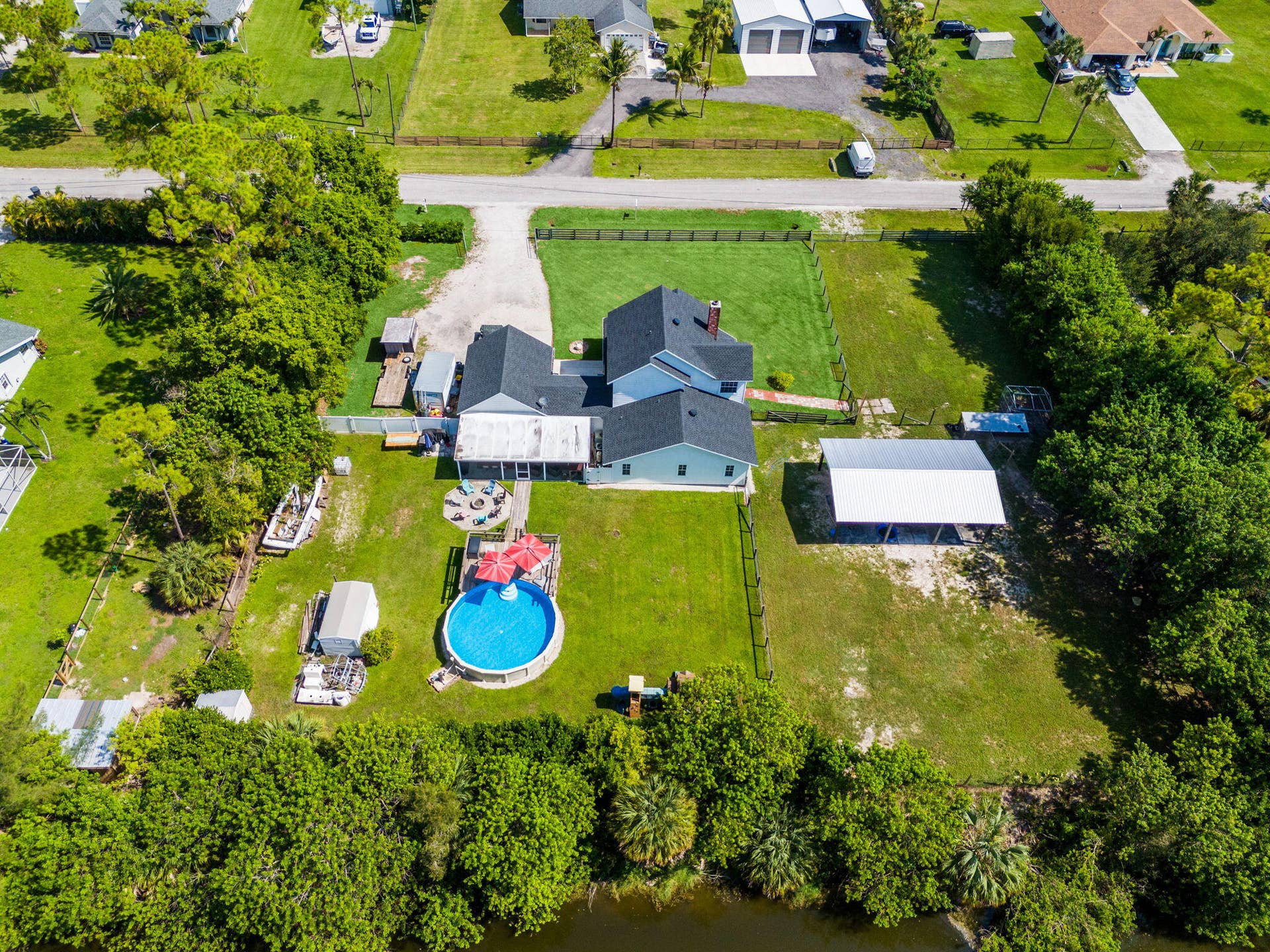 14366 73rd Street N, Loxahatchee, FL 33470 64-web-or-mls-DJI_20260812110833_0197_D