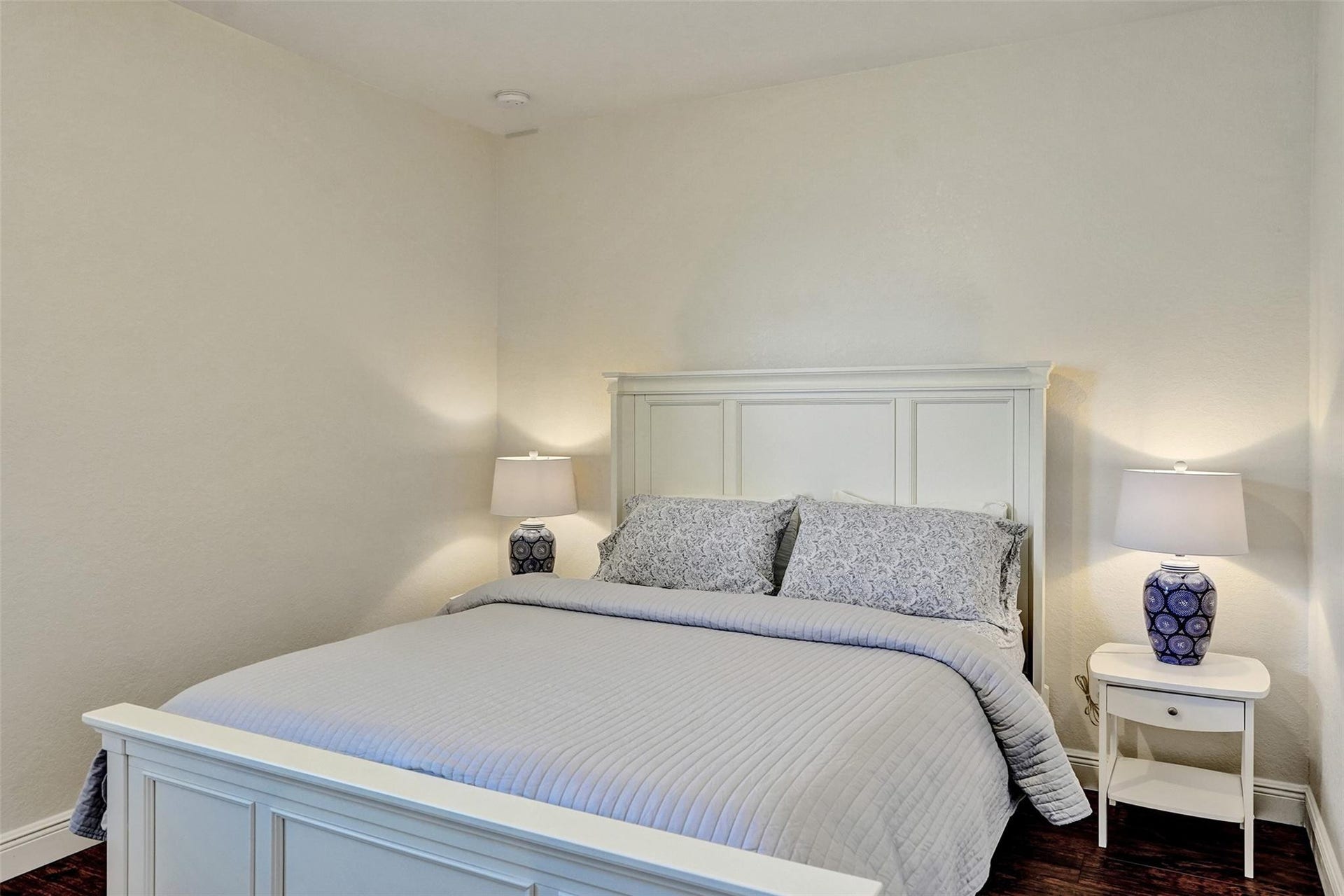 9749 Blue Isle, #BAY, Parkland, FL 33076 Recessed ceiling lighting, light-toned walls, and dark wood-finish flooring