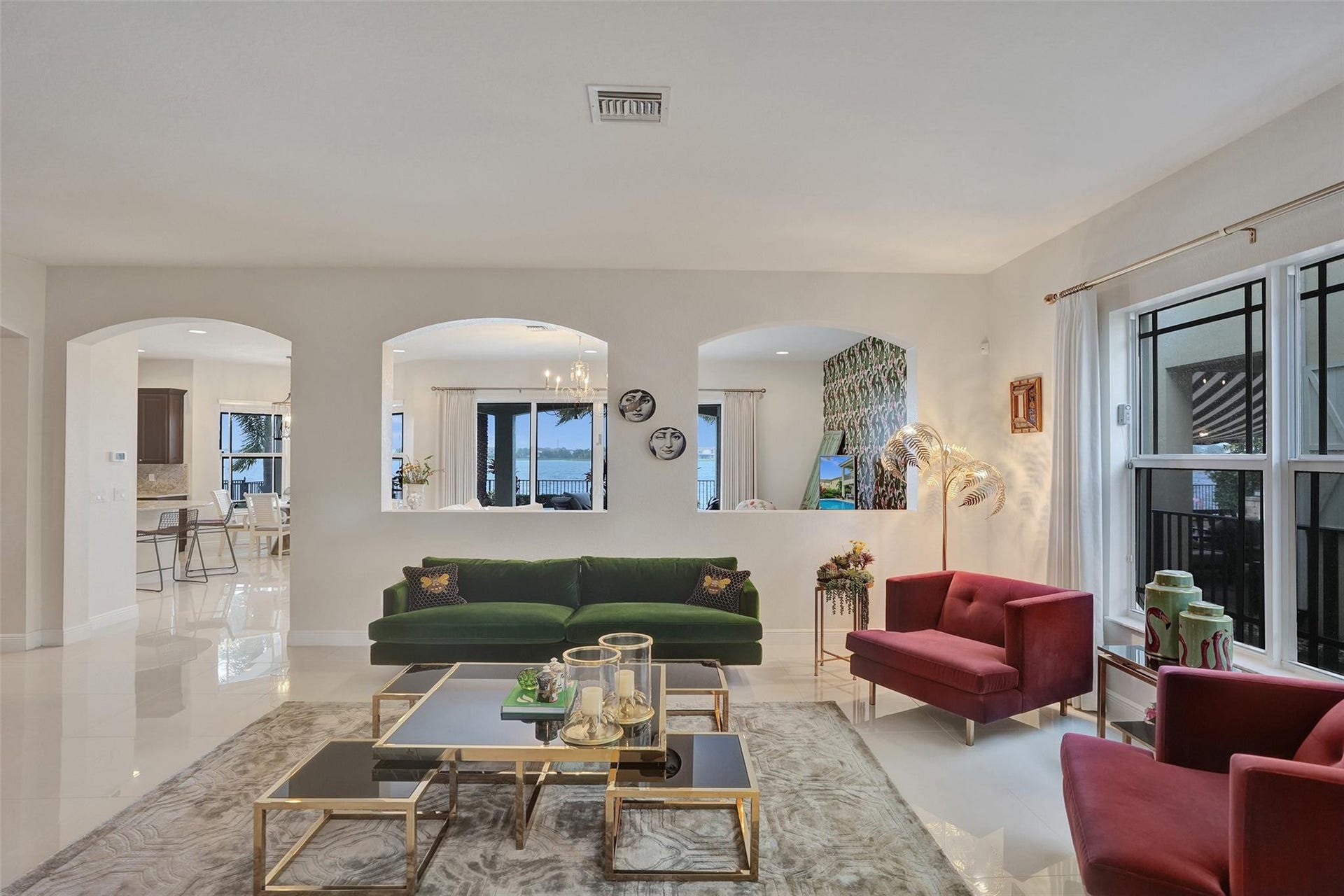 9749 Blue Isle, #BAY, Parkland, FL 33076 Arched entryways, high ceilings, large windows, and polished flooring contribute to a spacious interior