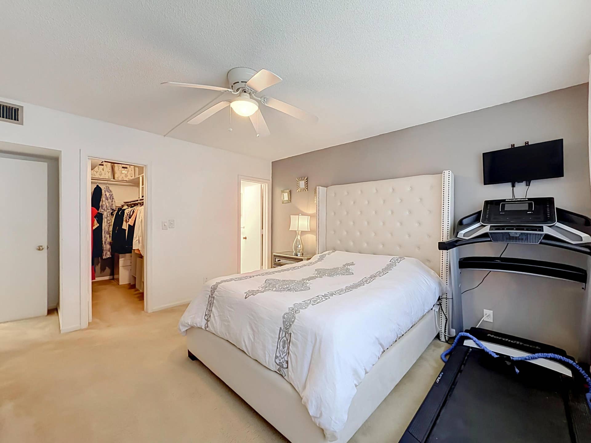 Recessed lighting, ceiling fan, walk-in closet, neutral wall tones, and carpeted flooring