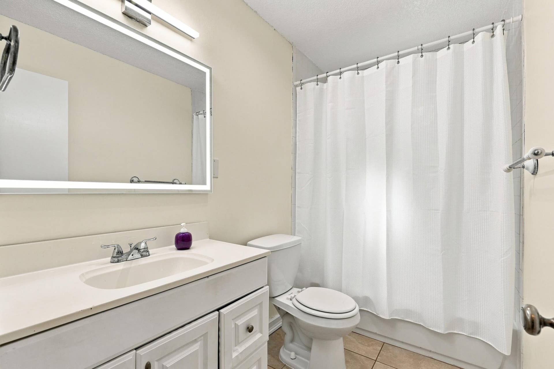 5114 Conklin Drive, Delray Beach, FL 33484 Full bathroom with vanity, tub and shower combination, and neutral finishes.