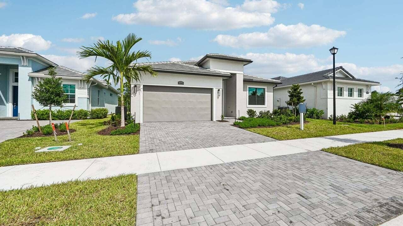 13566 SE Grovewood Drive, Port St Lucie, FL 34984 Front Exterior