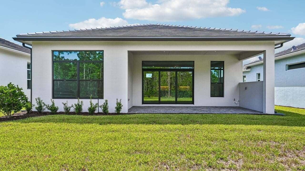 13566 SE Grovewood Drive, Port St Lucie, FL 34984 Rear Exterior