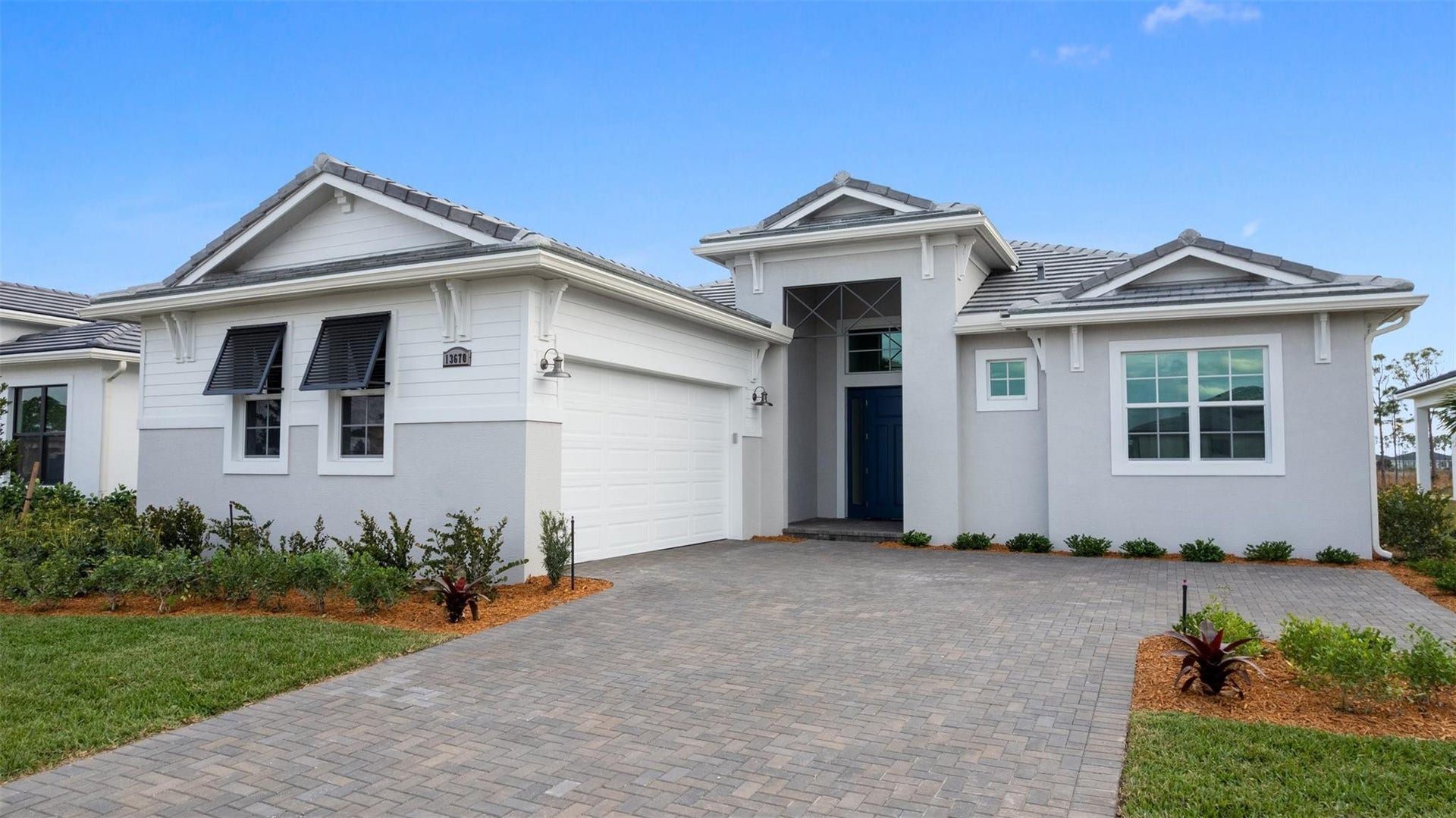 13670 SE Grovewood Drive, Port St Lucie, FL 34984 Front Exterior