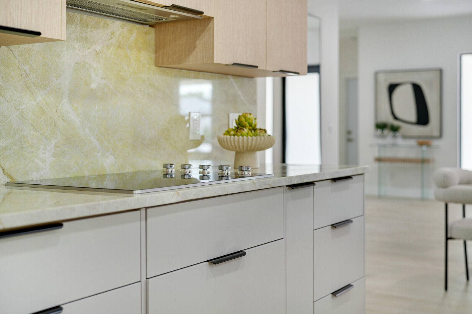 Custom Cabinetry & Stone Backsplash