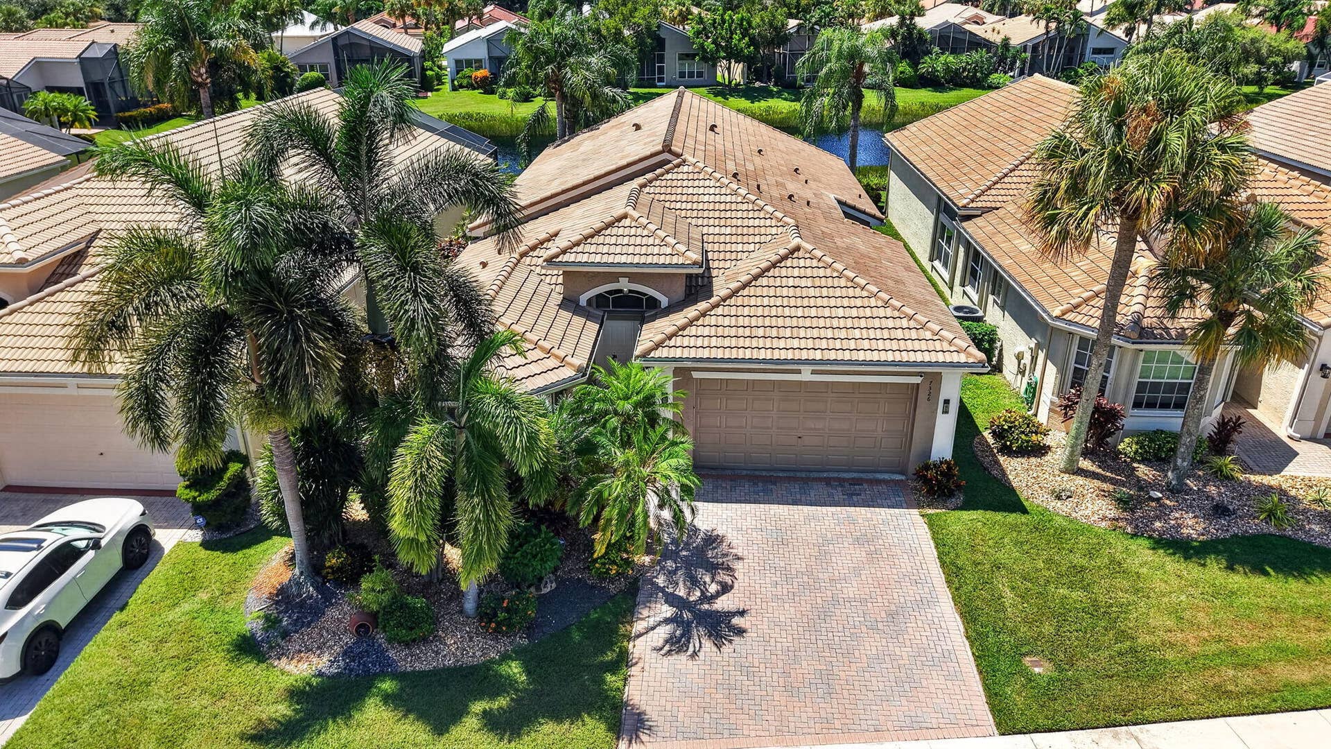 7326 Cortes Lake Drive, Delray Beach, FL 33446 AERIAL VIEW OF HOUSE
