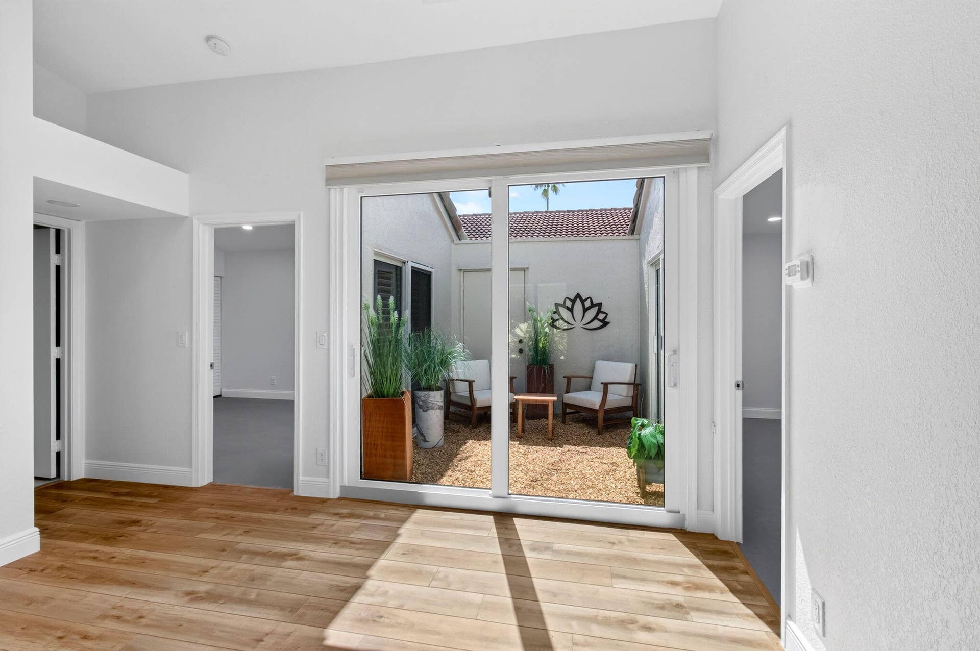 15441 Strathearn Drive, Delray Beach, FL 33446 with View of Atrium & Entry to Guest Bedroom