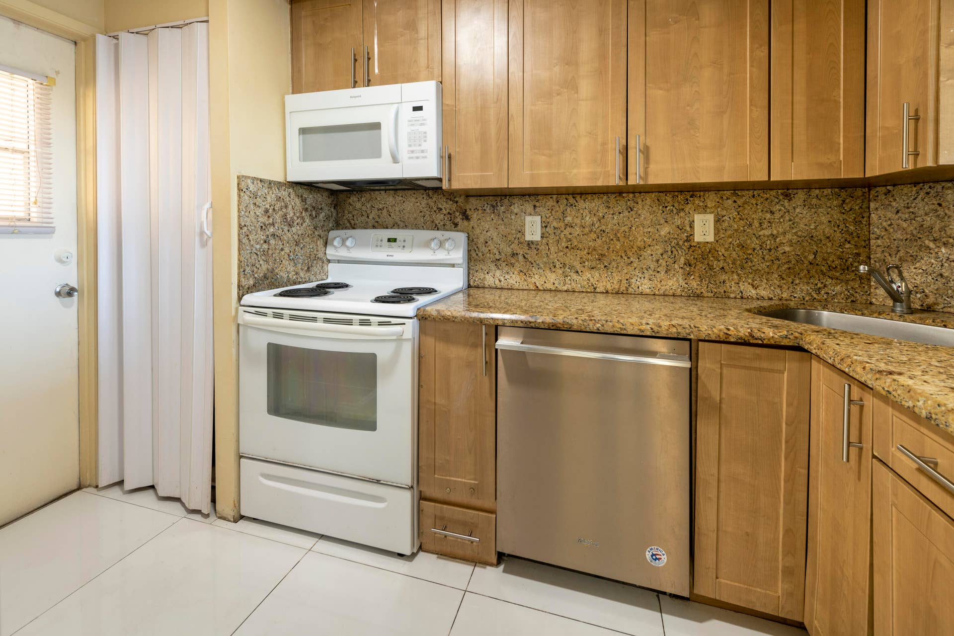 Kitchen with service entry way