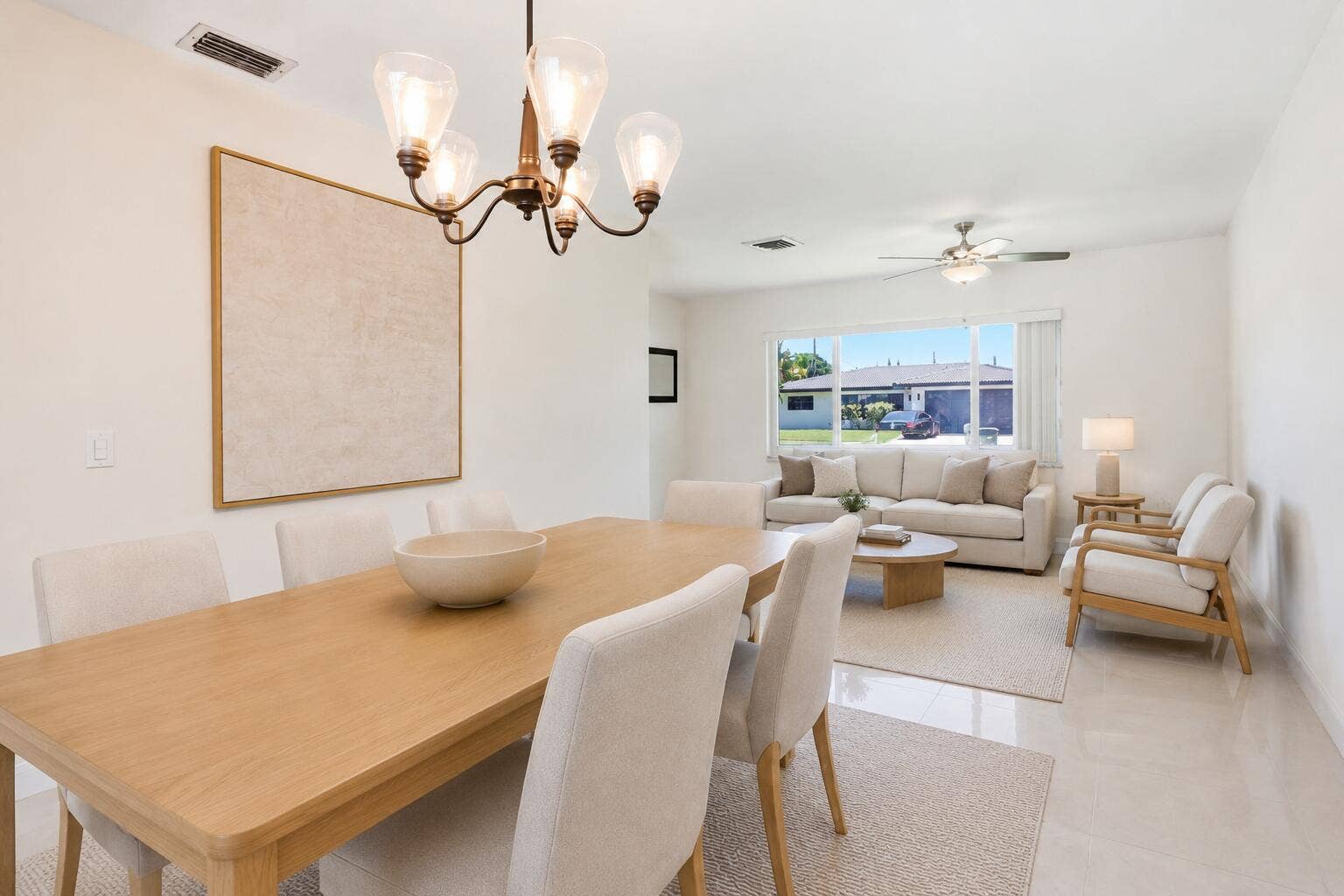 115 Orchard Ridge Lane, Boca Raton, FL 33431 Dining Room with view of Living Room. (virtually staged for illustrative purposes; no permanent features or finishes have been altered)